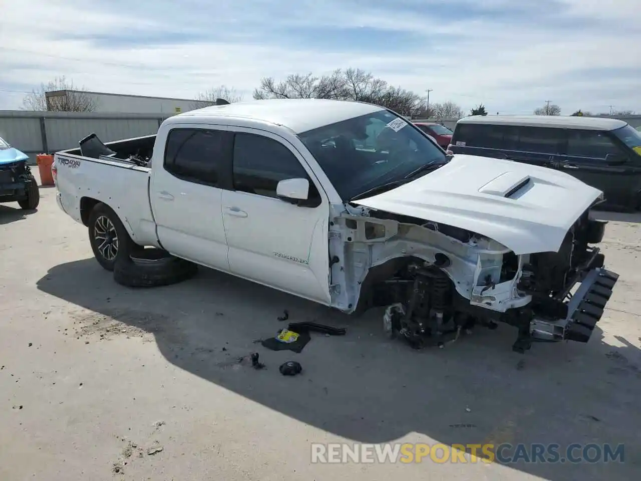 4 Photograph of a damaged car 3TMDZ5BN0PM152753 TOYOTA TACOMA 2023