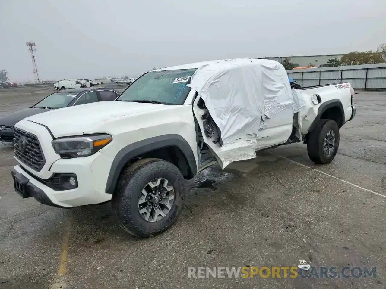 1 Photograph of a damaged car 3TMDZ5BNXPM151528 TOYOTA TACOMA 2023