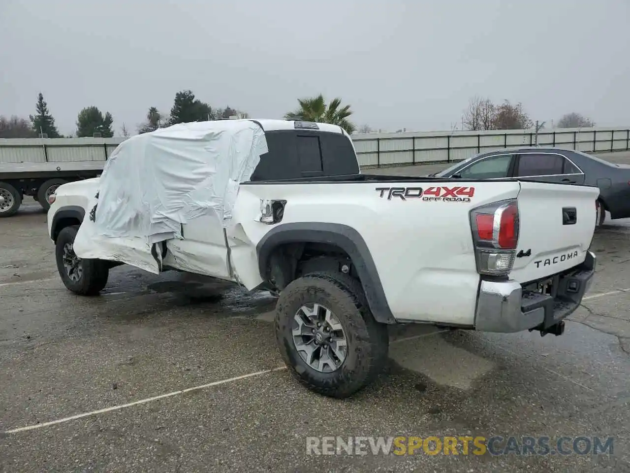 2 Photograph of a damaged car 3TMDZ5BNXPM151528 TOYOTA TACOMA 2023