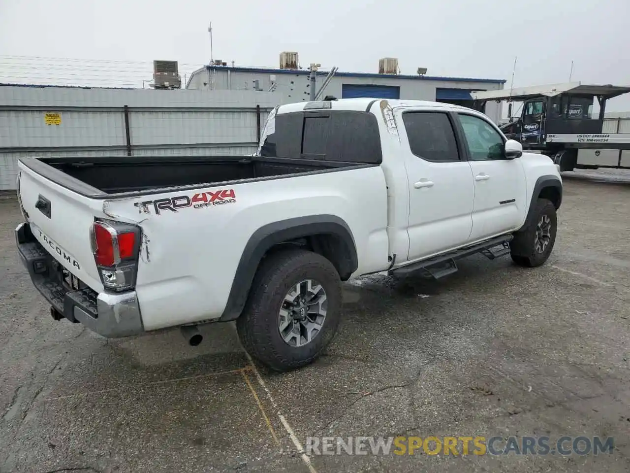 3 Photograph of a damaged car 3TMDZ5BNXPM151528 TOYOTA TACOMA 2023