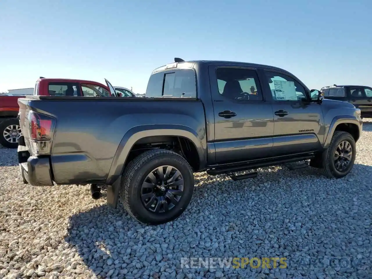 3 Photograph of a damaged car 3TMGZ5AN7PM633372 TOYOTA TACOMA 2023