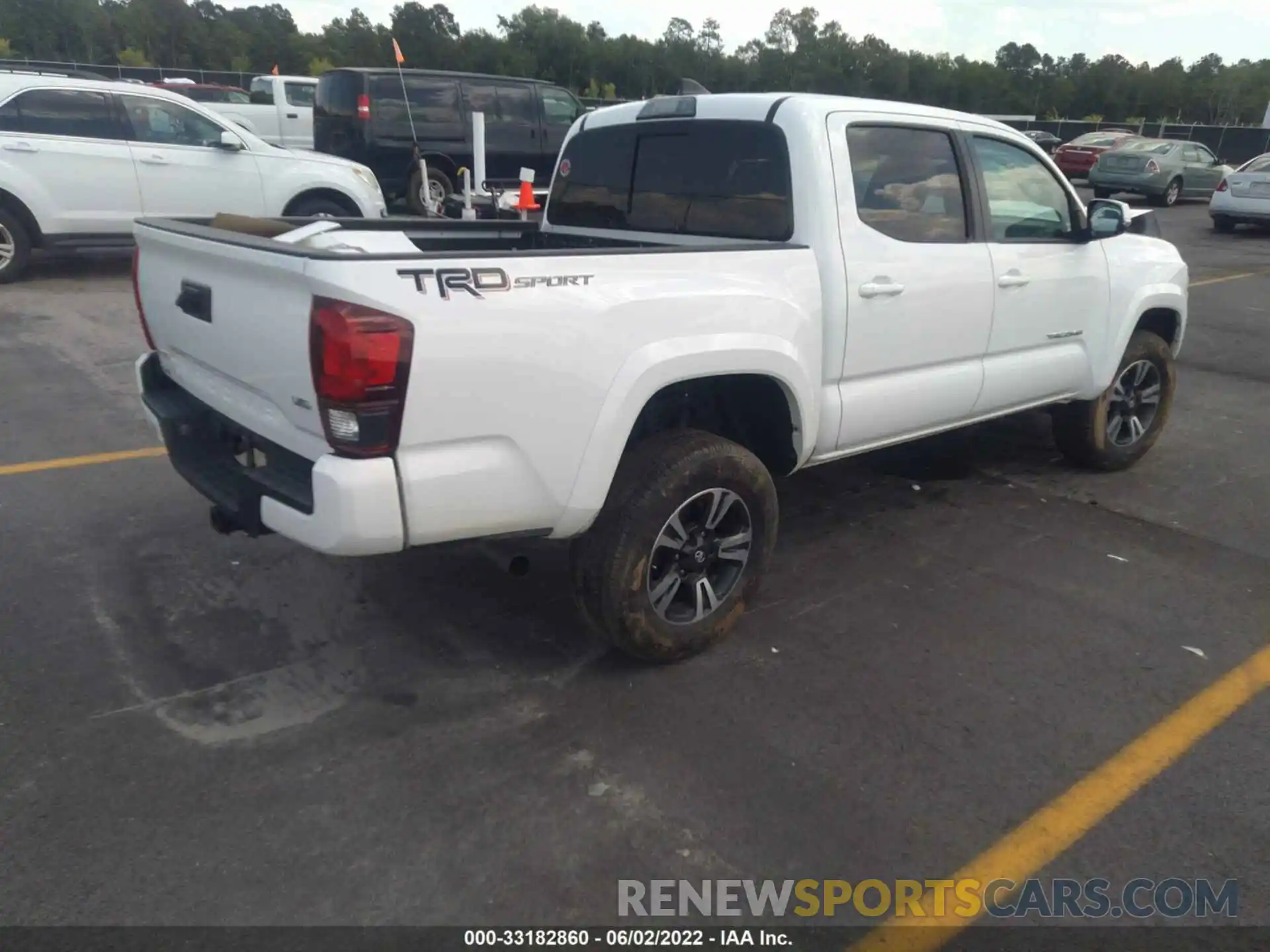 4 Photograph of a damaged car 3TMAZ5CN0KM106303 TOYOTA TACOMA 2WD 2019