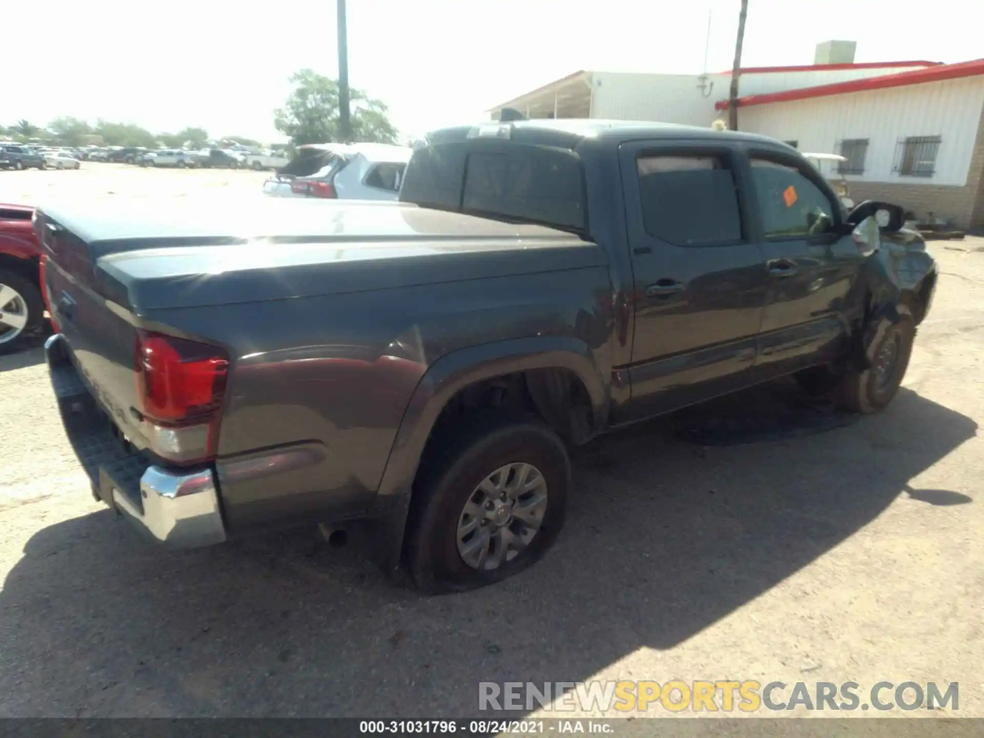 4 Photograph of a damaged car 3TMAZ5CN0KM106740 TOYOTA TACOMA 2WD 2019