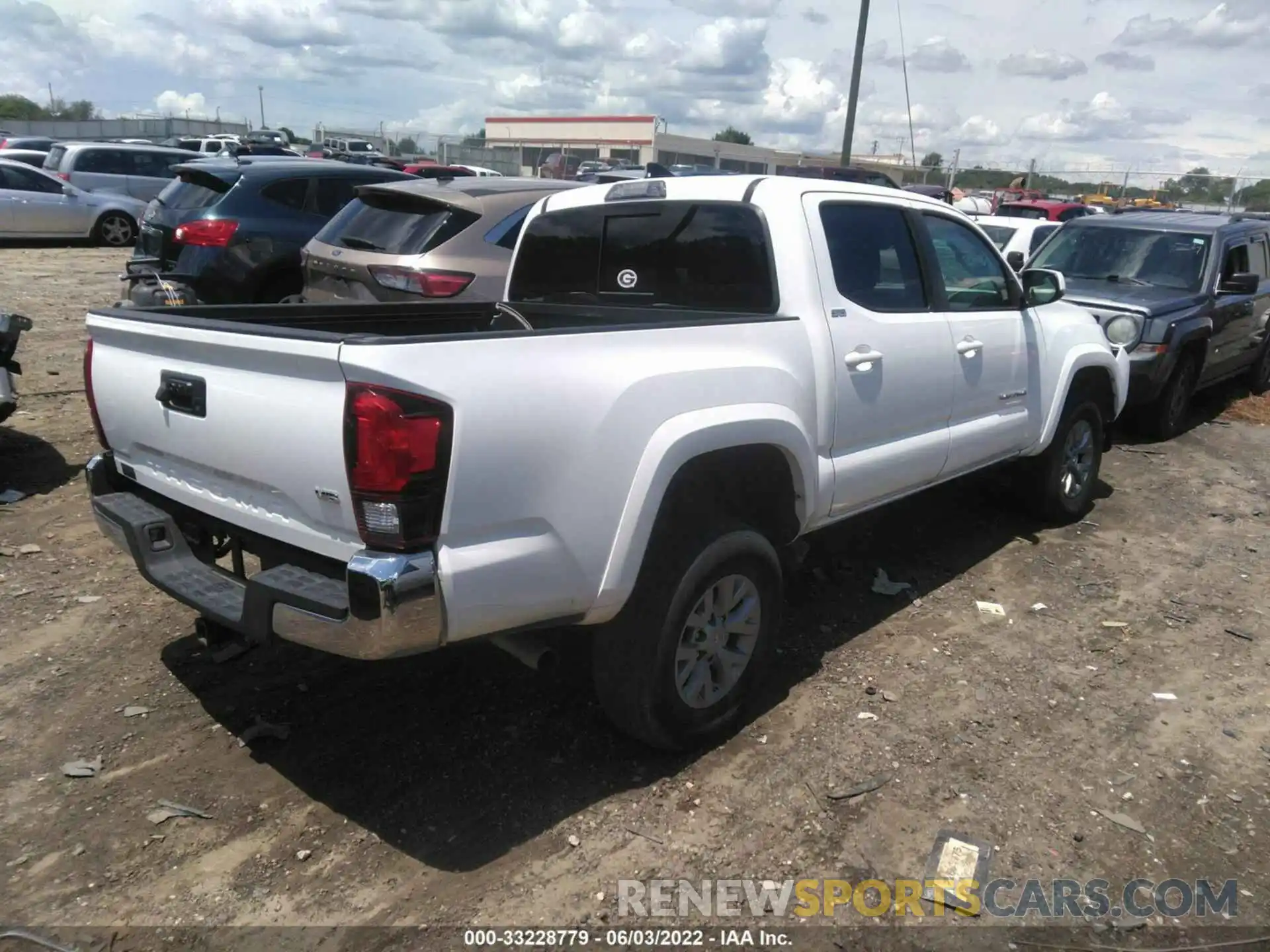 4 Photograph of a damaged car 3TMAZ5CN0KM106978 TOYOTA TACOMA 2WD 2019