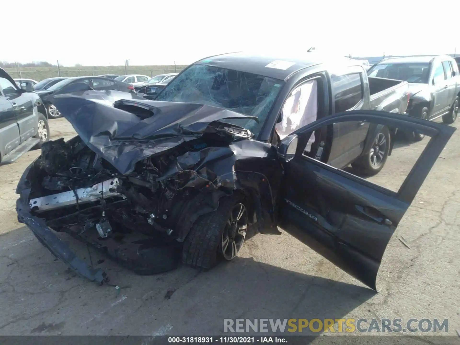 2 Photograph of a damaged car 3TMAZ5CN0KM107404 TOYOTA TACOMA 2WD 2019