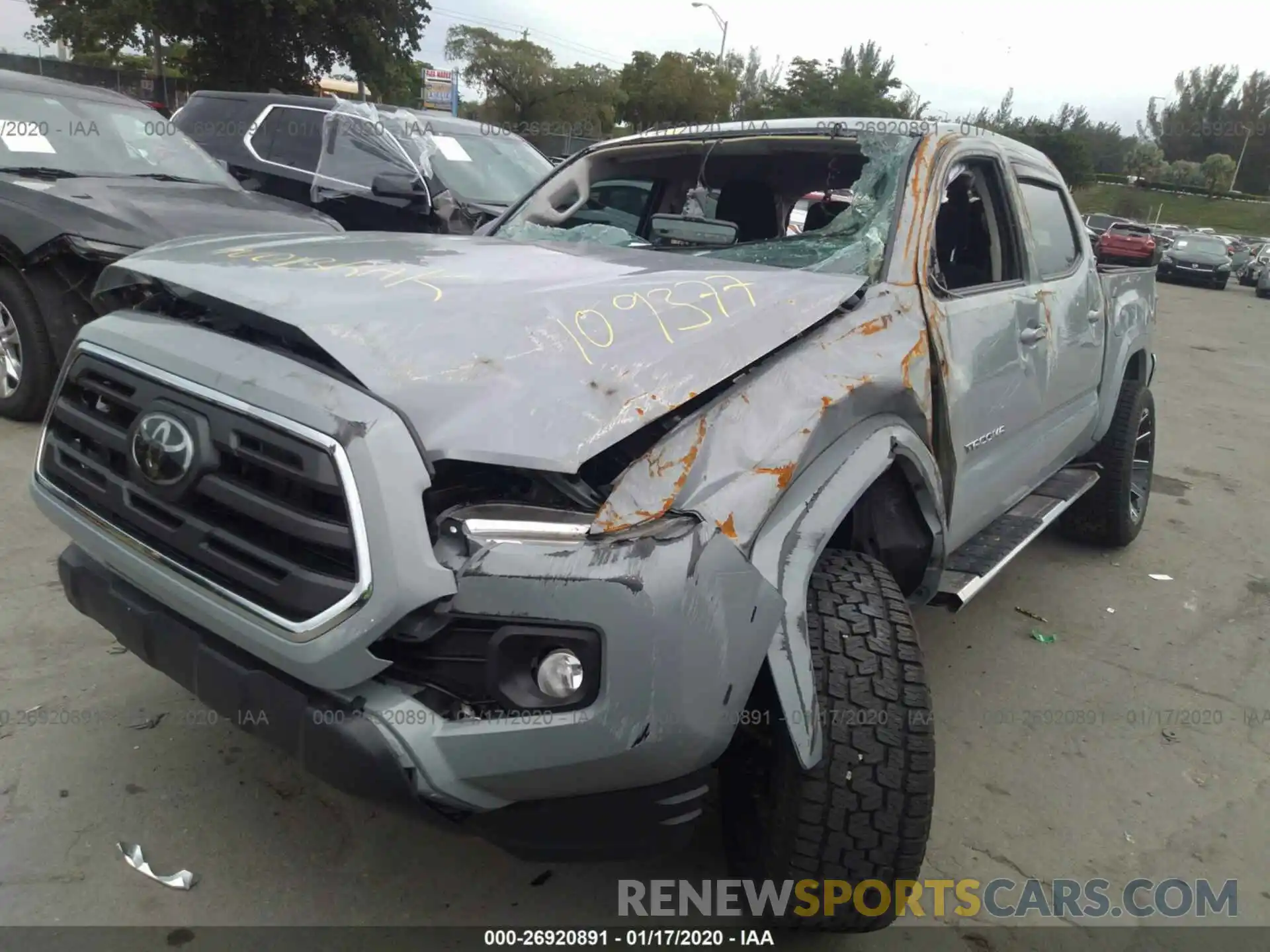 6 Photograph of a damaged car 3TMAZ5CN0KM109377 TOYOTA TACOMA 2WD 2019