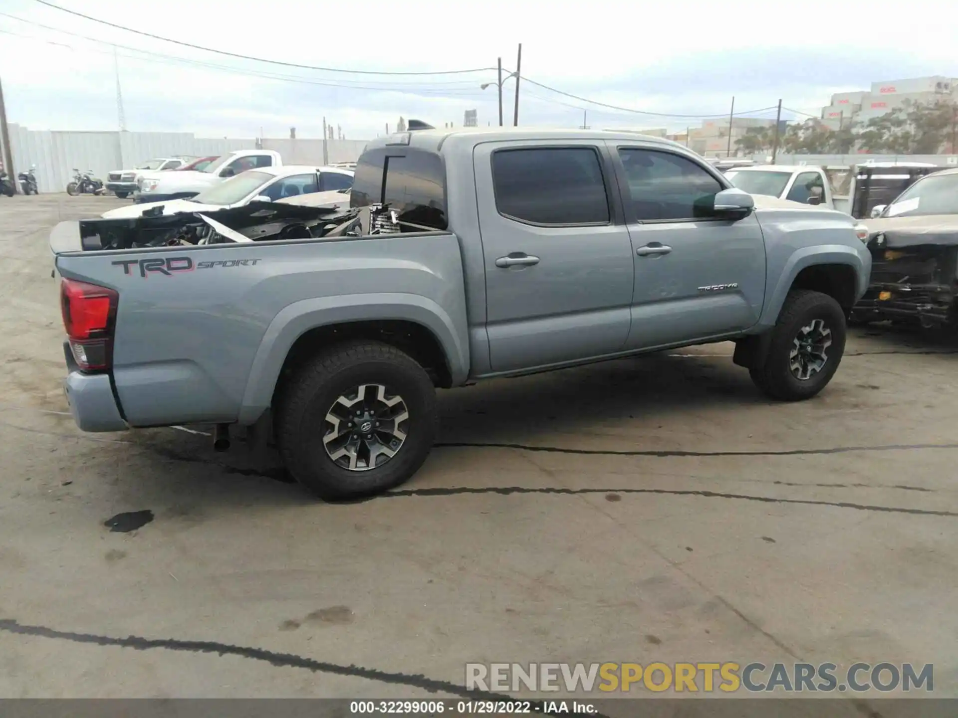 4 Photograph of a damaged car 3TMAZ5CN0KM110724 TOYOTA TACOMA 2WD 2019