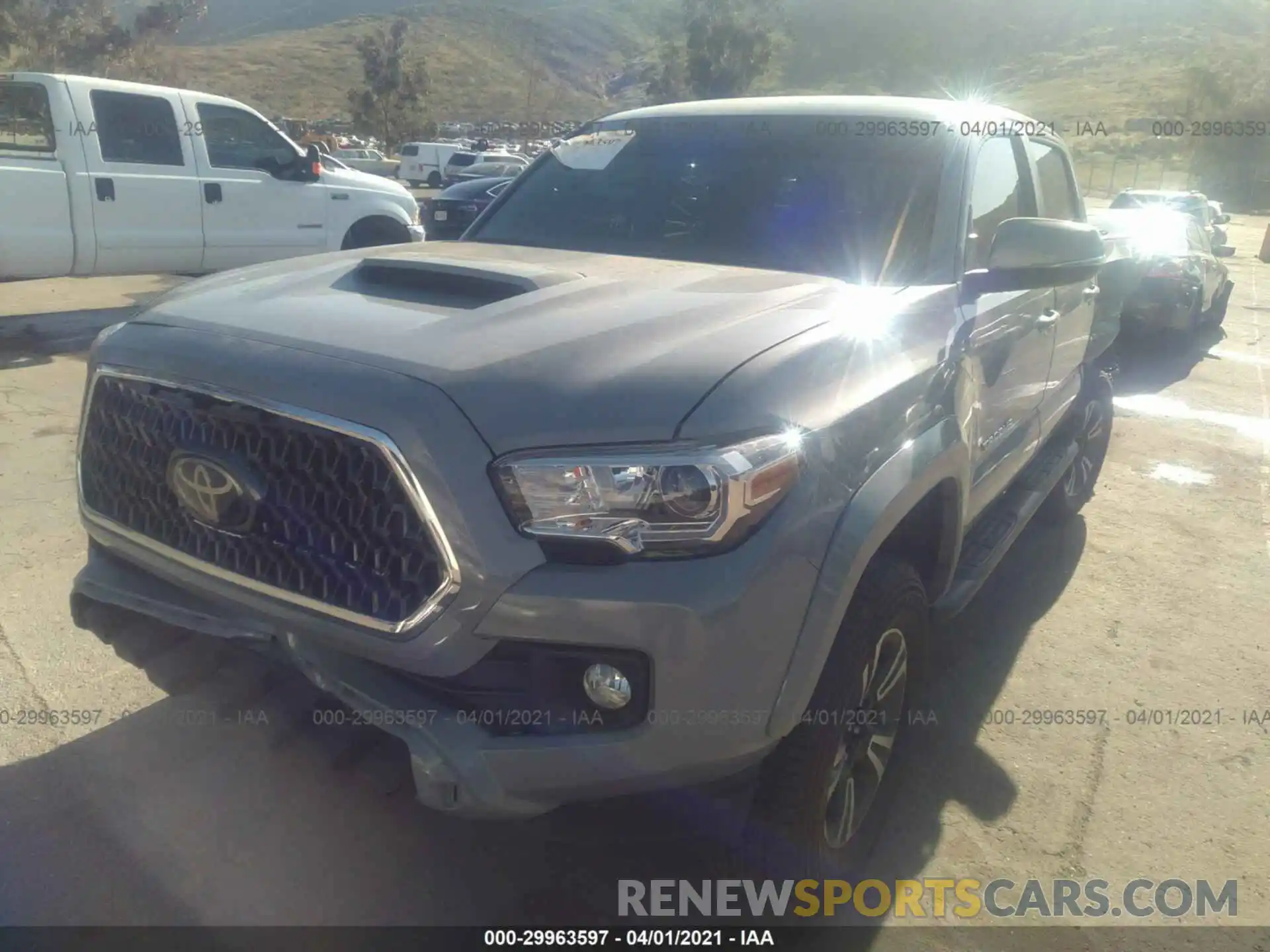 2 Photograph of a damaged car 3TMAZ5CN0KM114224 TOYOTA TACOMA 2WD 2019