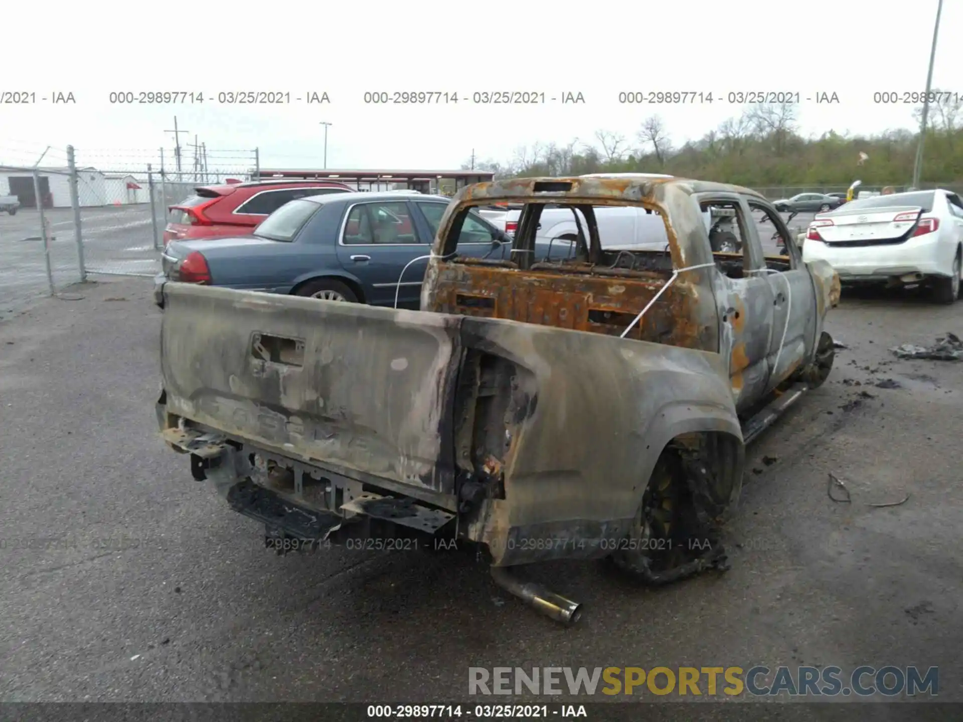 4 Photograph of a damaged car 3TMAZ5CN1KM085932 TOYOTA TACOMA 2WD 2019