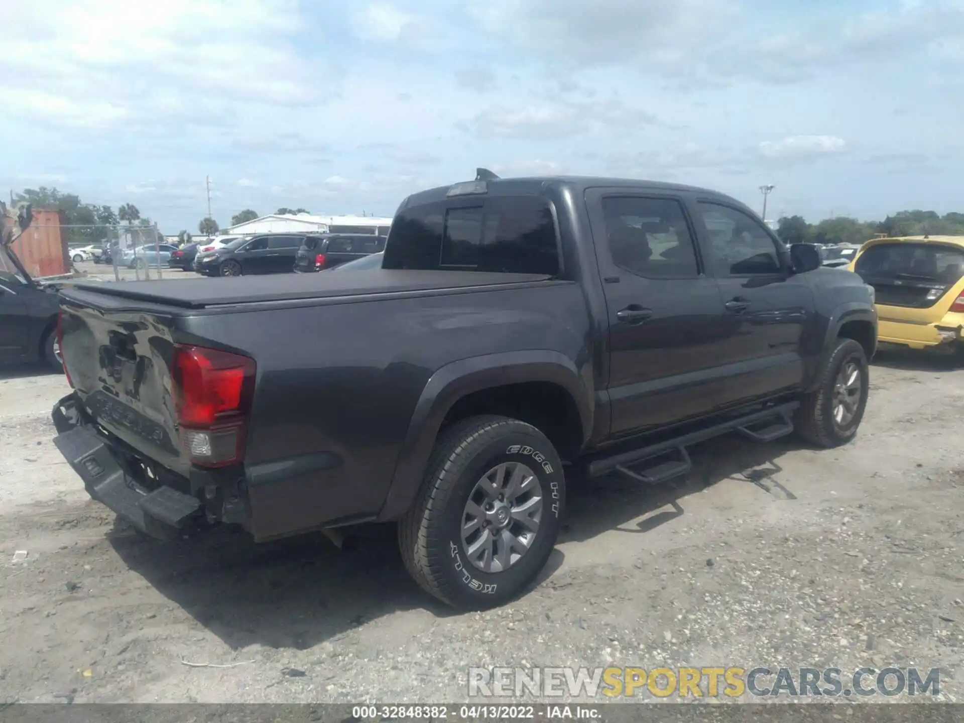 4 Photograph of a damaged car 3TMAZ5CN1KM087499 TOYOTA TACOMA 2WD 2019