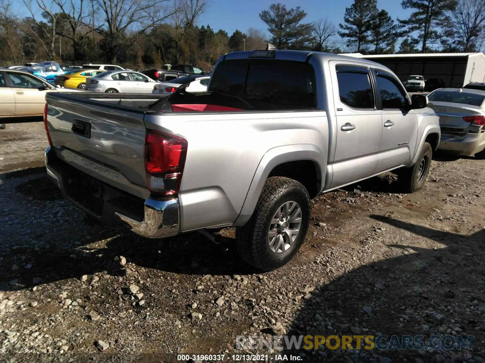 4 Photograph of a damaged car 3TMAZ5CN1KM088023 TOYOTA TACOMA 2WD 2019