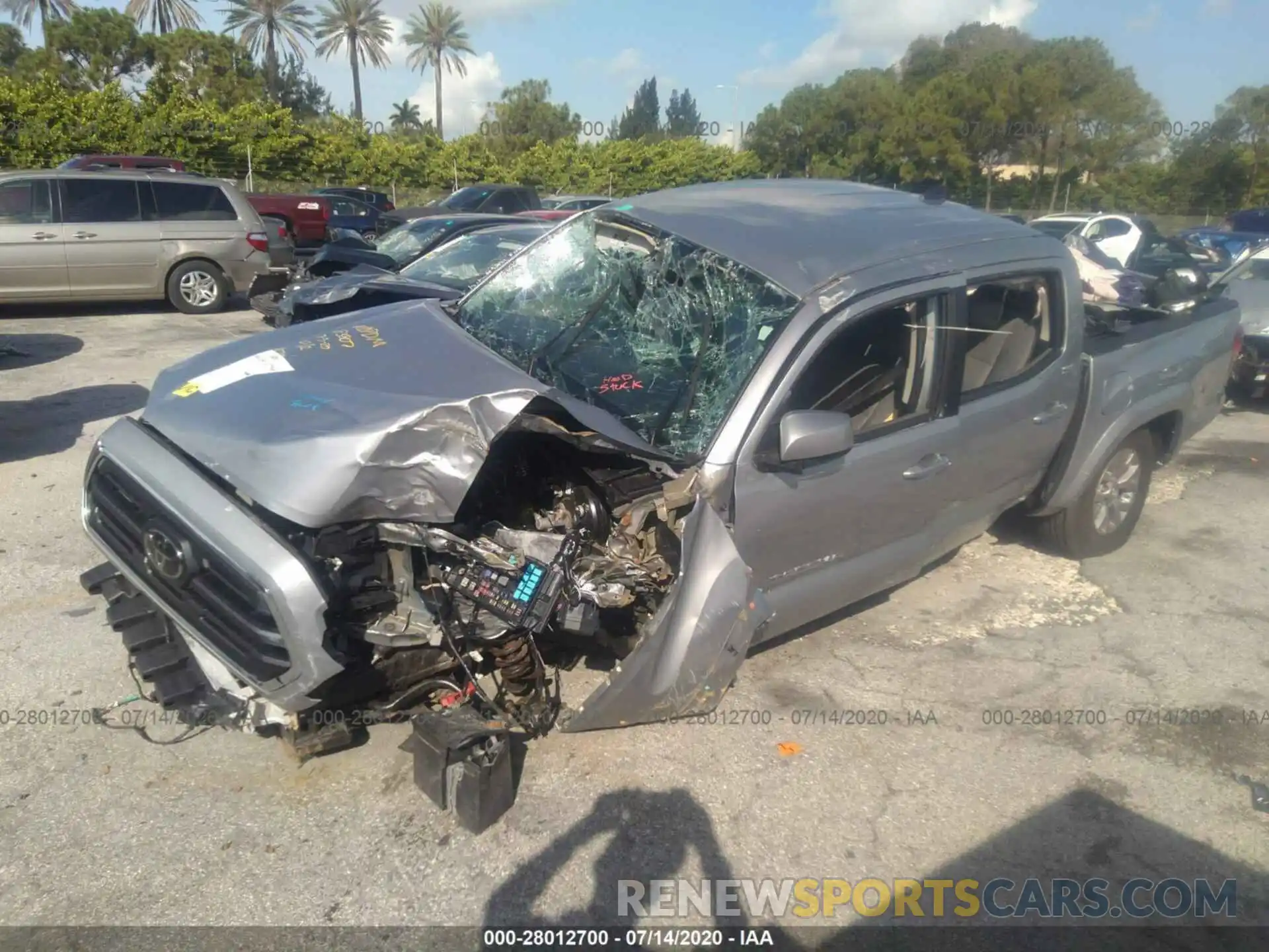 2 Photograph of a damaged car 3TMAZ5CN1KM094744 TOYOTA TACOMA 2WD 2019