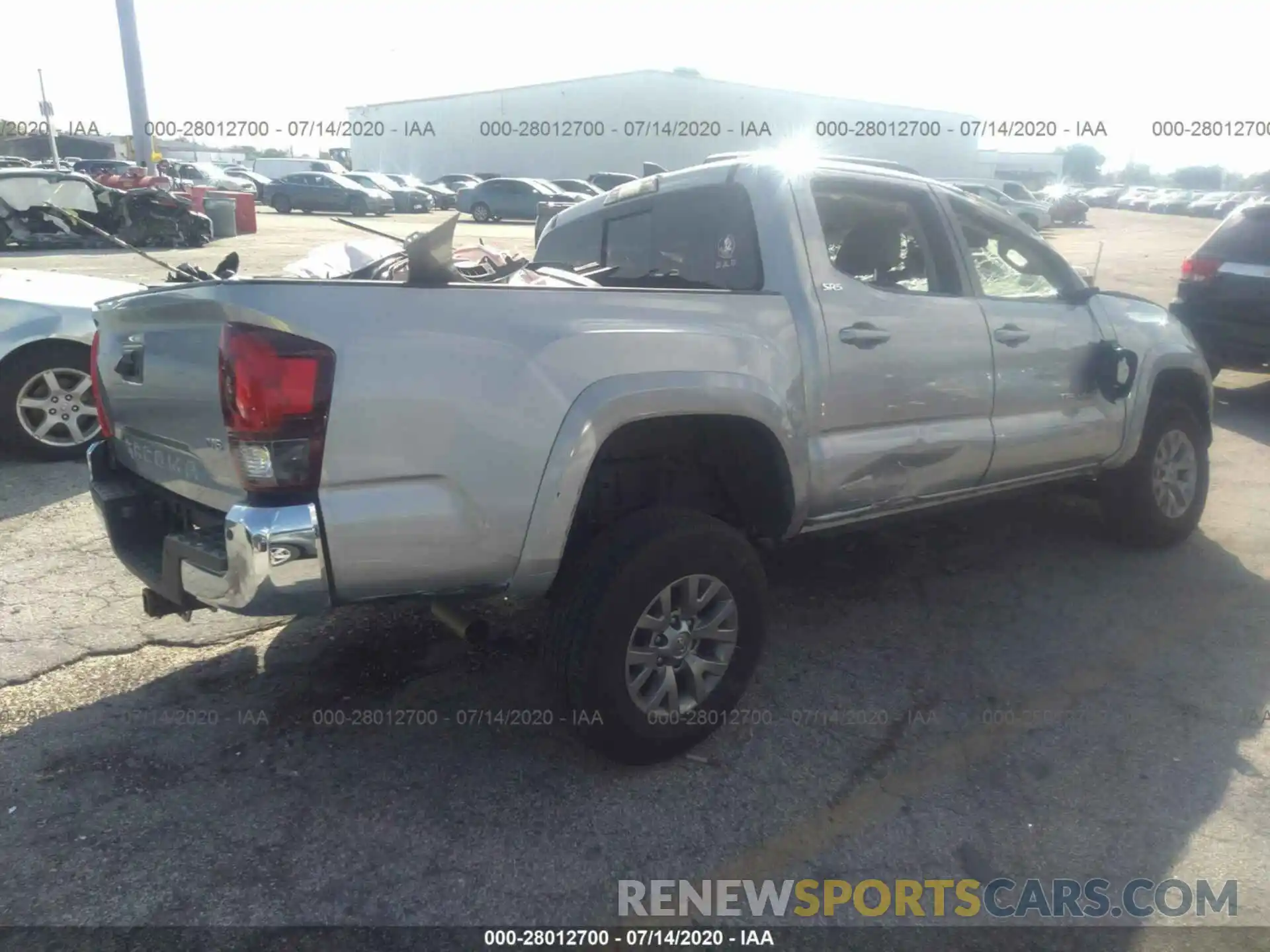 4 Photograph of a damaged car 3TMAZ5CN1KM094744 TOYOTA TACOMA 2WD 2019