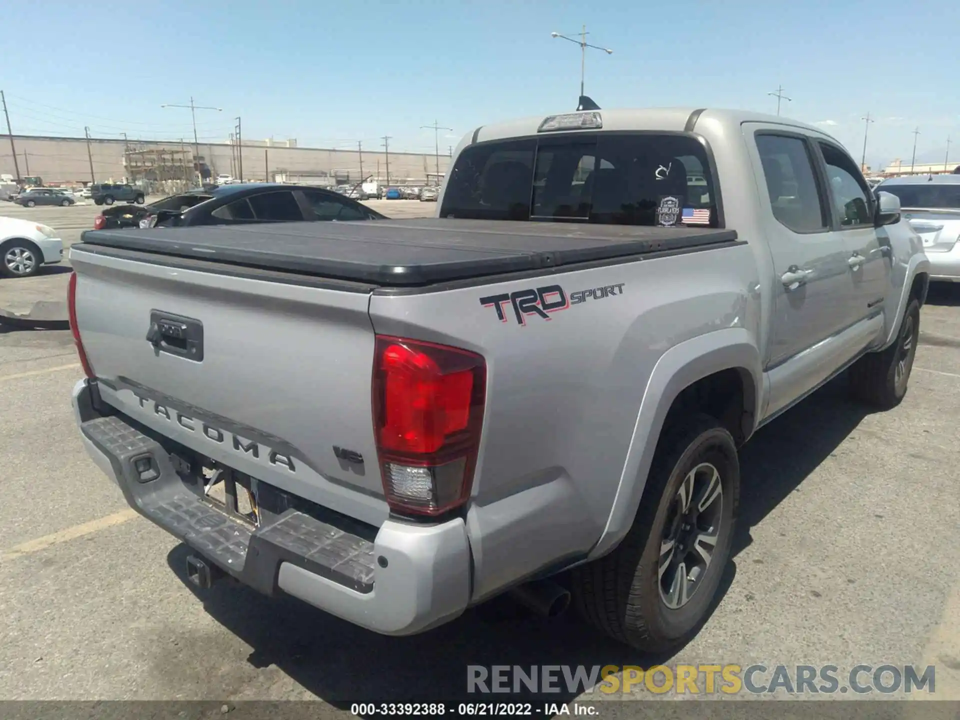 4 Photograph of a damaged car 3TMAZ5CN1KM099927 TOYOTA TACOMA 2WD 2019