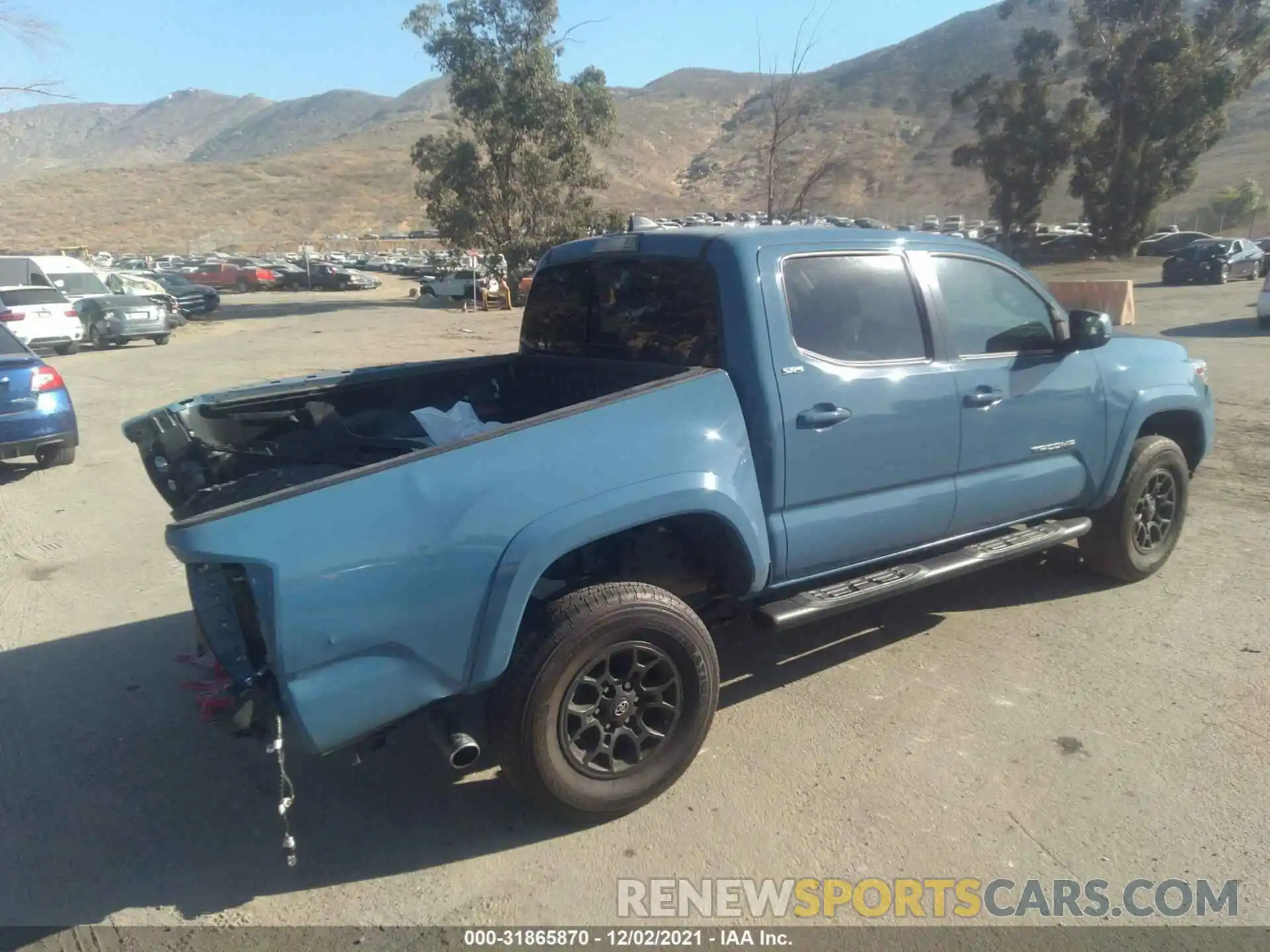 4 Photograph of a damaged car 3TMAZ5CN1KM101997 TOYOTA TACOMA 2WD 2019