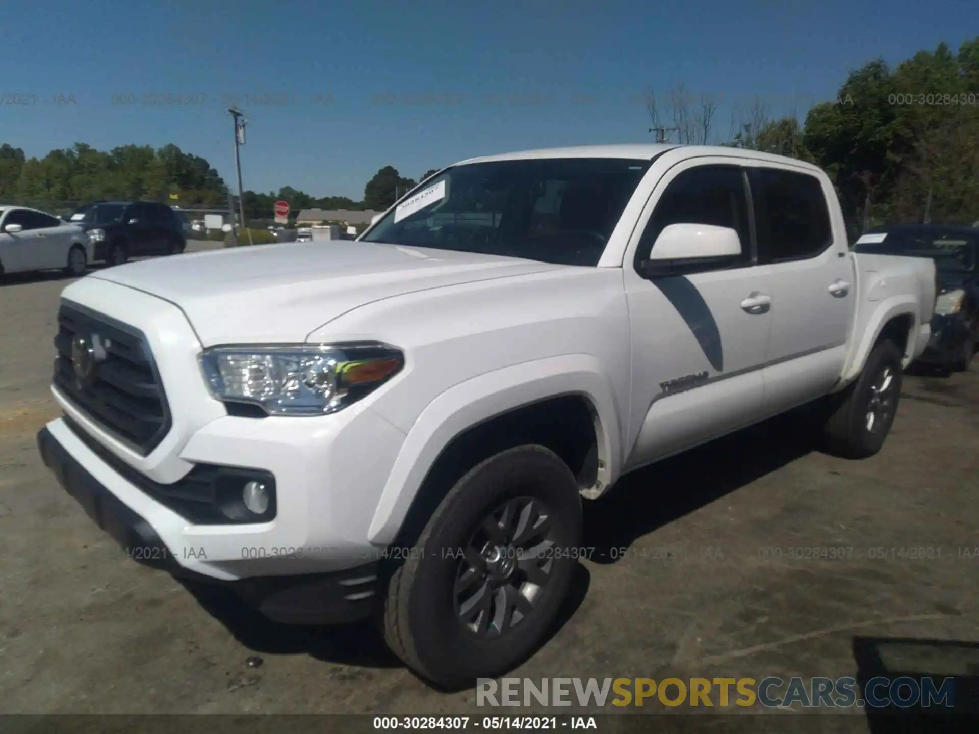 2 Photograph of a damaged car 3TMAZ5CN1KM102373 TOYOTA TACOMA 2WD 2019