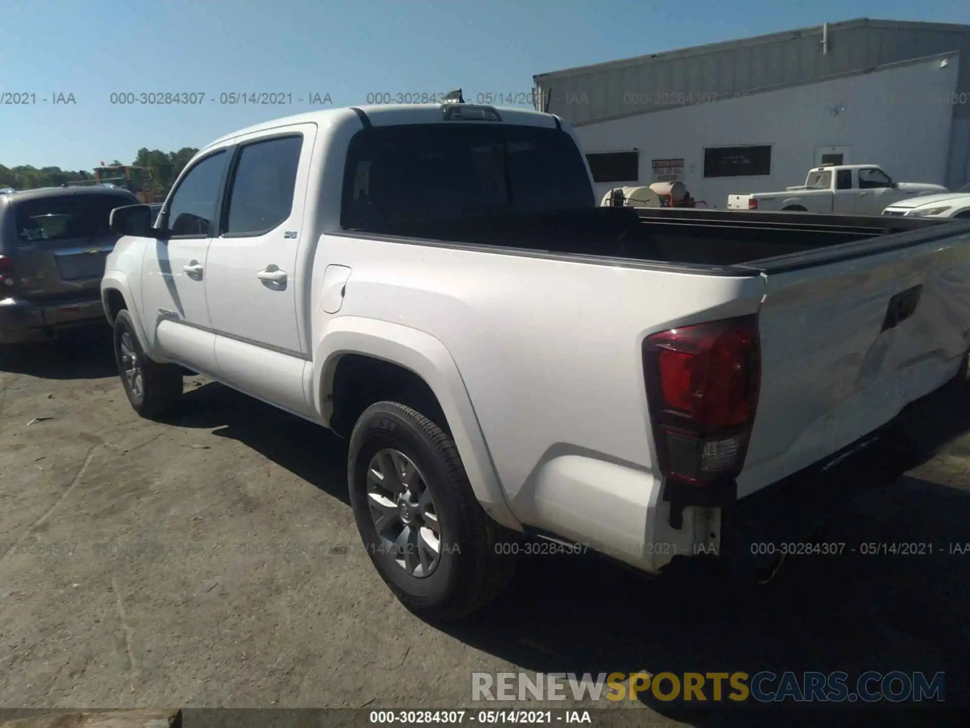 3 Photograph of a damaged car 3TMAZ5CN1KM102373 TOYOTA TACOMA 2WD 2019