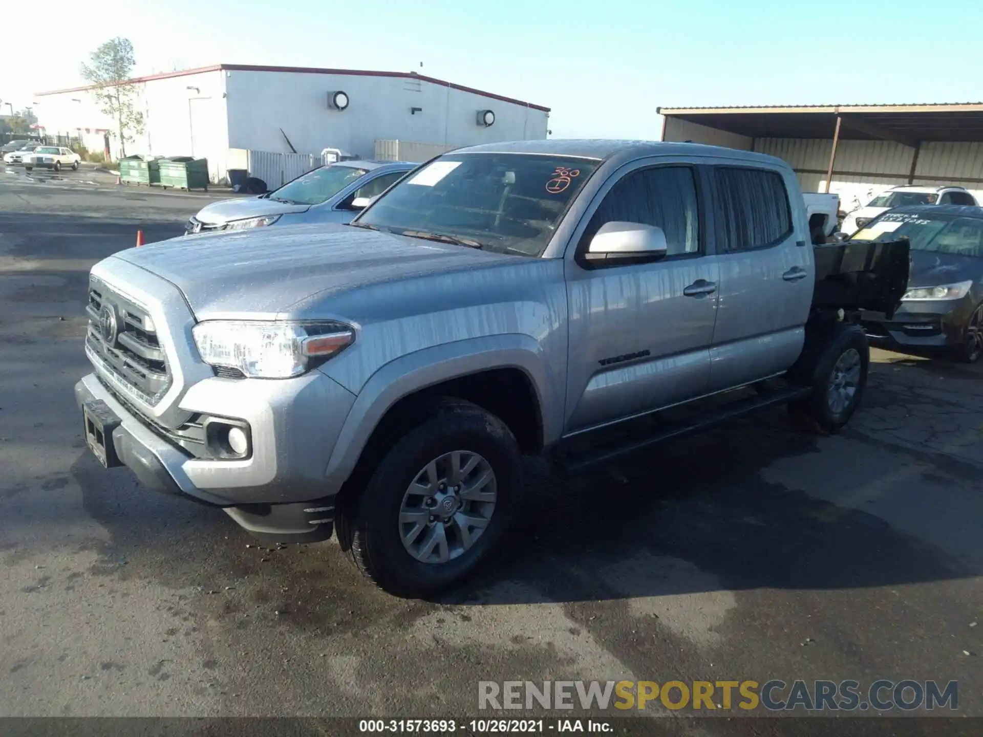 2 Photograph of a damaged car 3TMAZ5CN1KM103622 TOYOTA TACOMA 2WD 2019