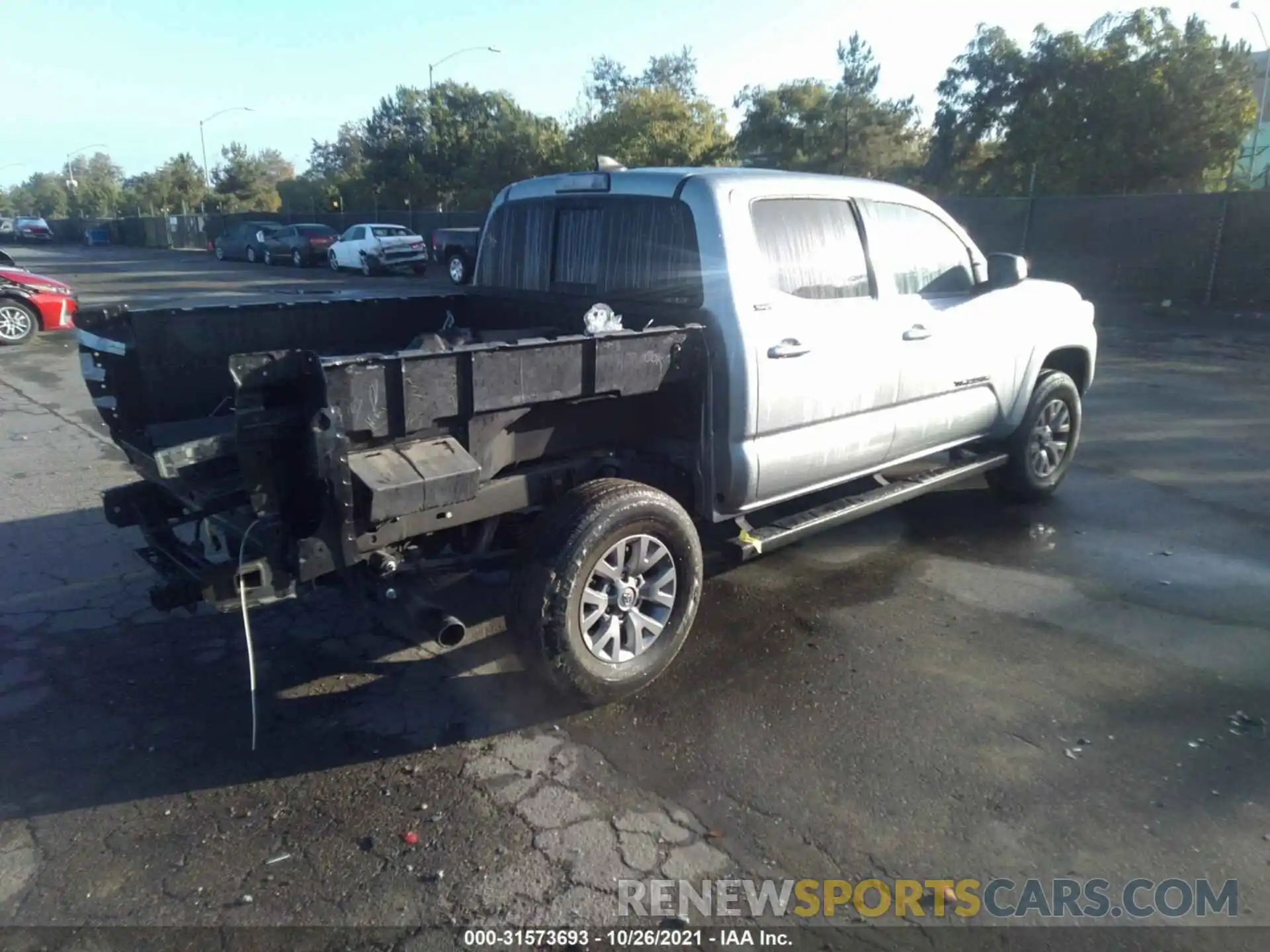 4 Photograph of a damaged car 3TMAZ5CN1KM103622 TOYOTA TACOMA 2WD 2019