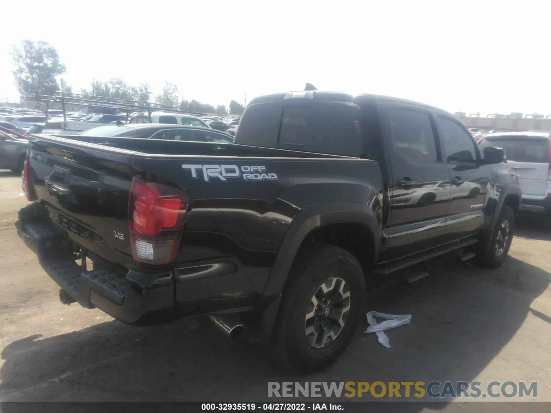 4 Photograph of a damaged car 3TMAZ5CN1KM104706 TOYOTA TACOMA 2WD 2019