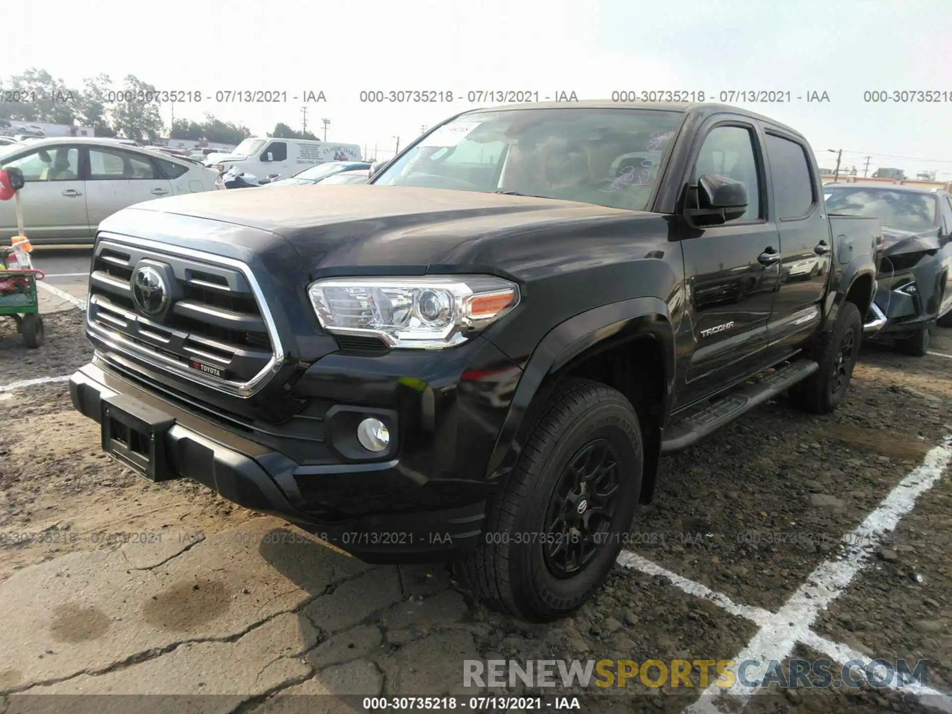 2 Photograph of a damaged car 3TMAZ5CN1KM107668 TOYOTA TACOMA 2WD 2019