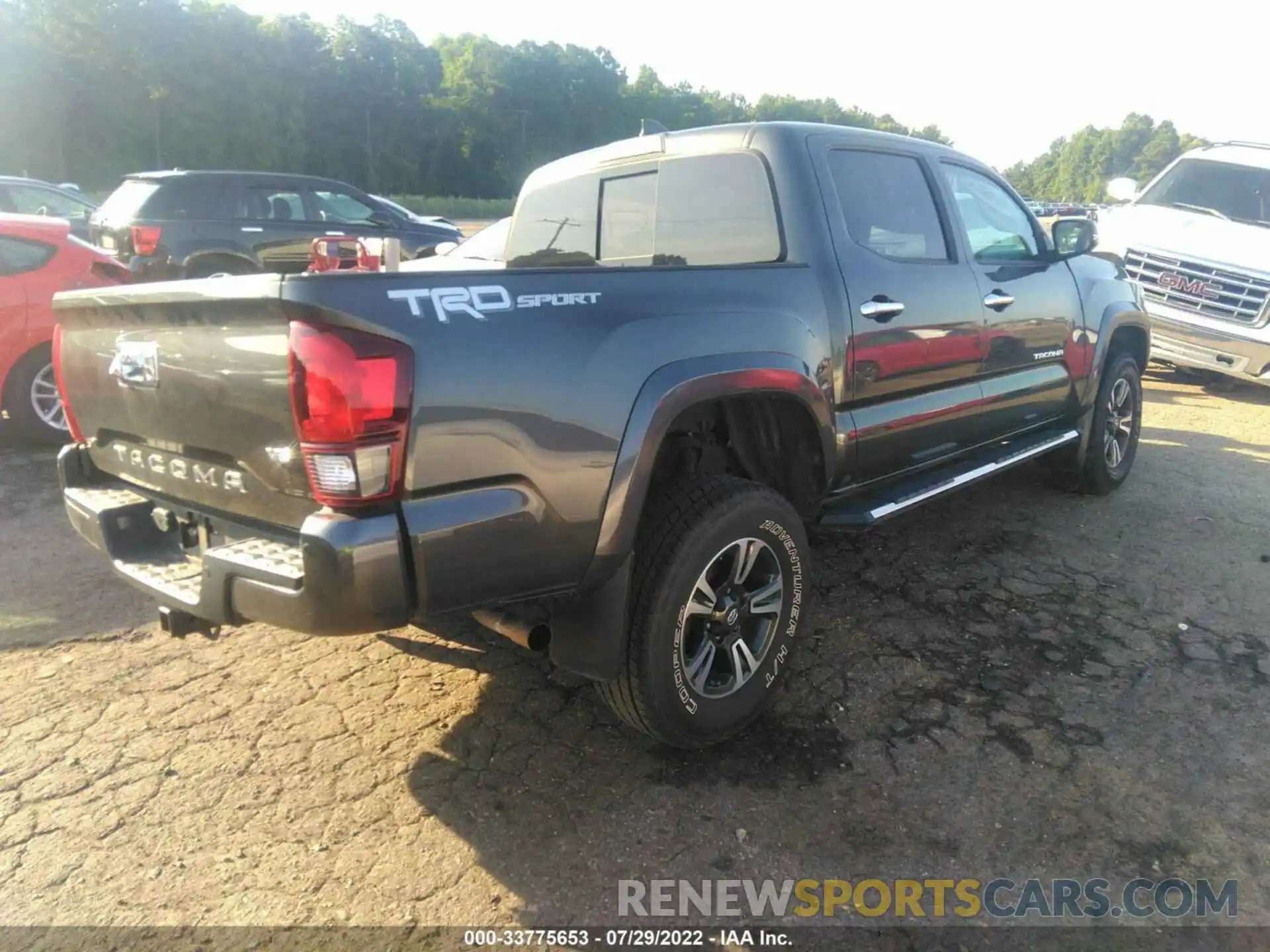 4 Photograph of a damaged car 3TMAZ5CN1KM110635 TOYOTA TACOMA 2WD 2019