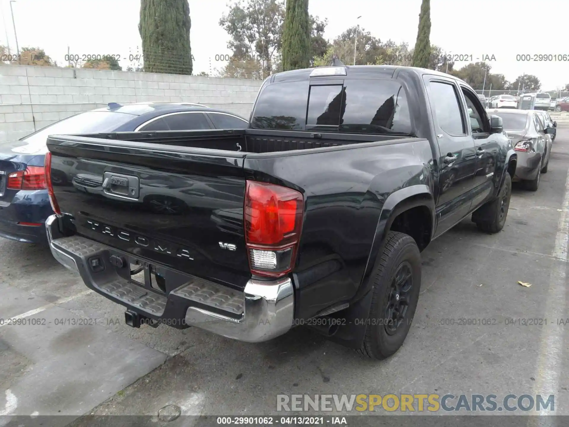 4 Photograph of a damaged car 3TMAZ5CN1KM111252 TOYOTA TACOMA 2WD 2019