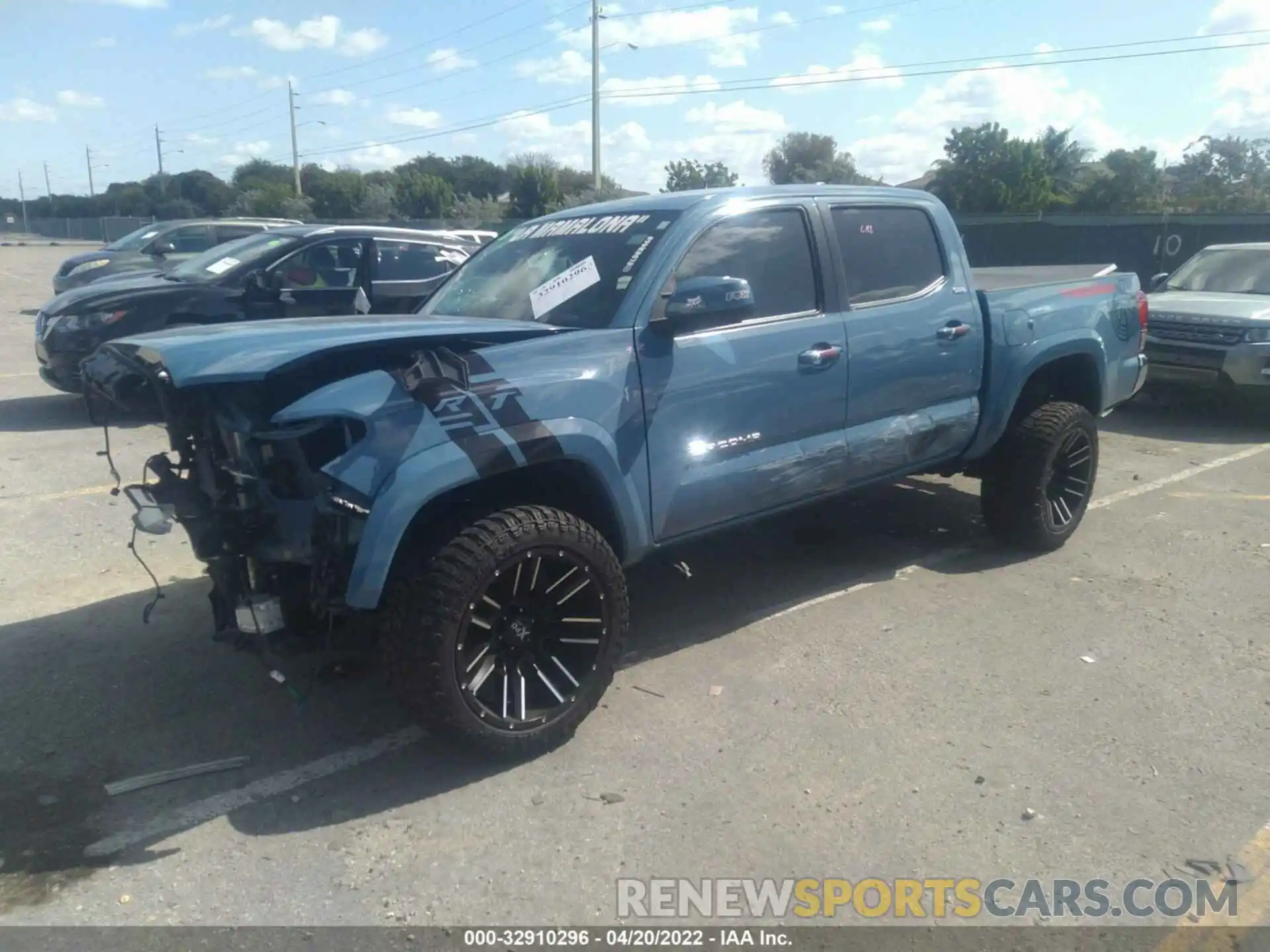 2 Photograph of a damaged car 3TMAZ5CN1KM111929 TOYOTA TACOMA 2WD 2019