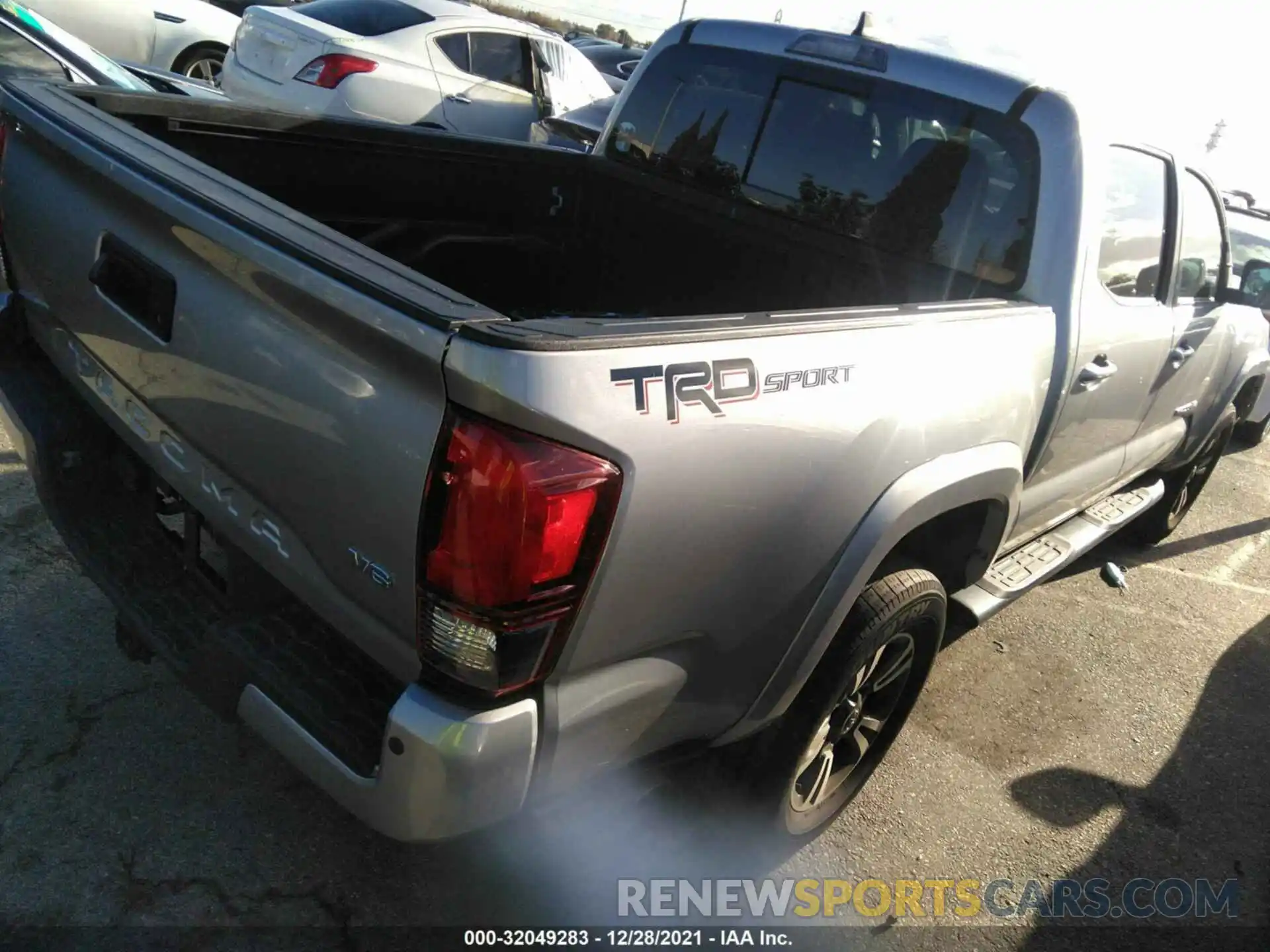 4 Photograph of a damaged car 3TMAZ5CN2KM080190 TOYOTA TACOMA 2WD 2019