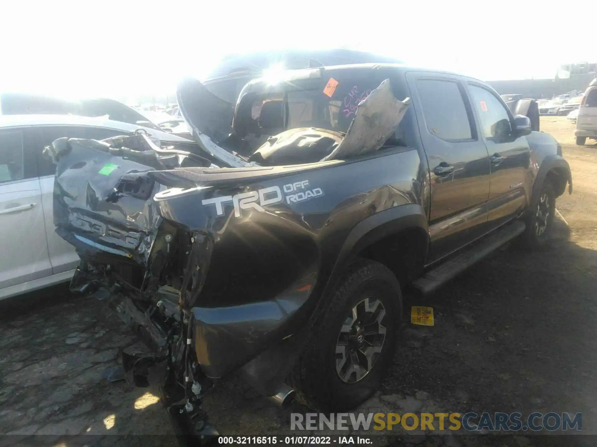 4 Photograph of a damaged car 3TMAZ5CN2KM087494 TOYOTA TACOMA 2WD 2019