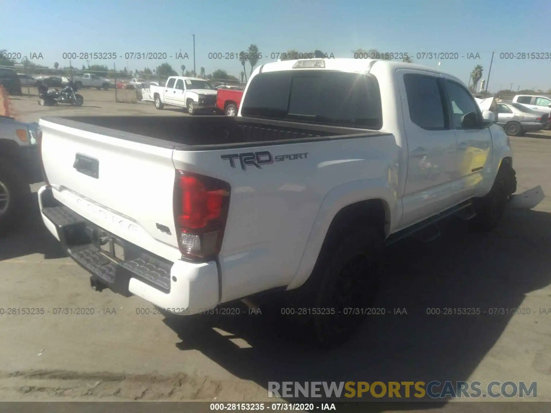 4 Photograph of a damaged car 3TMAZ5CN2KM090962 TOYOTA TACOMA 2WD 2019