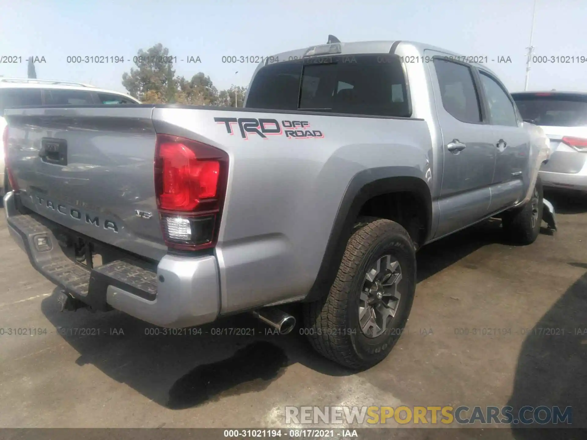 4 Photograph of a damaged car 3TMAZ5CN2KM091044 TOYOTA TACOMA 2WD 2019