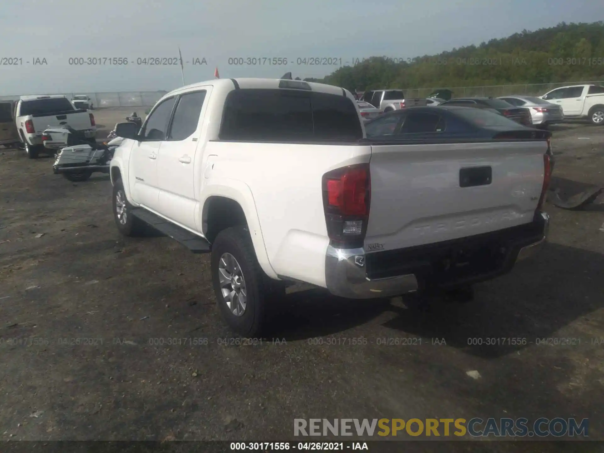 3 Photograph of a damaged car 3TMAZ5CN2KM097099 TOYOTA TACOMA 2WD 2019