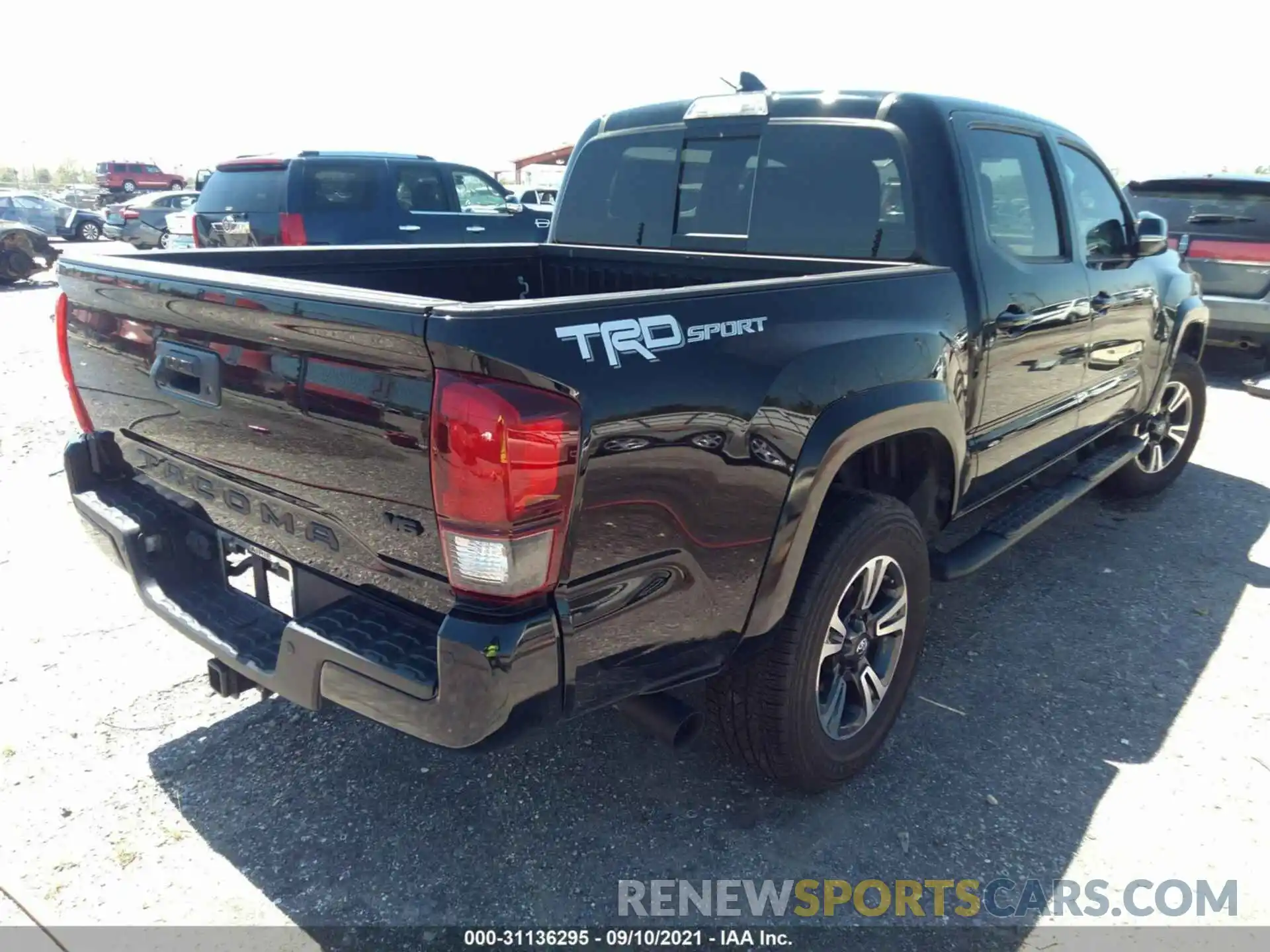 4 Photograph of a damaged car 3TMAZ5CN2KM102687 TOYOTA TACOMA 2WD 2019