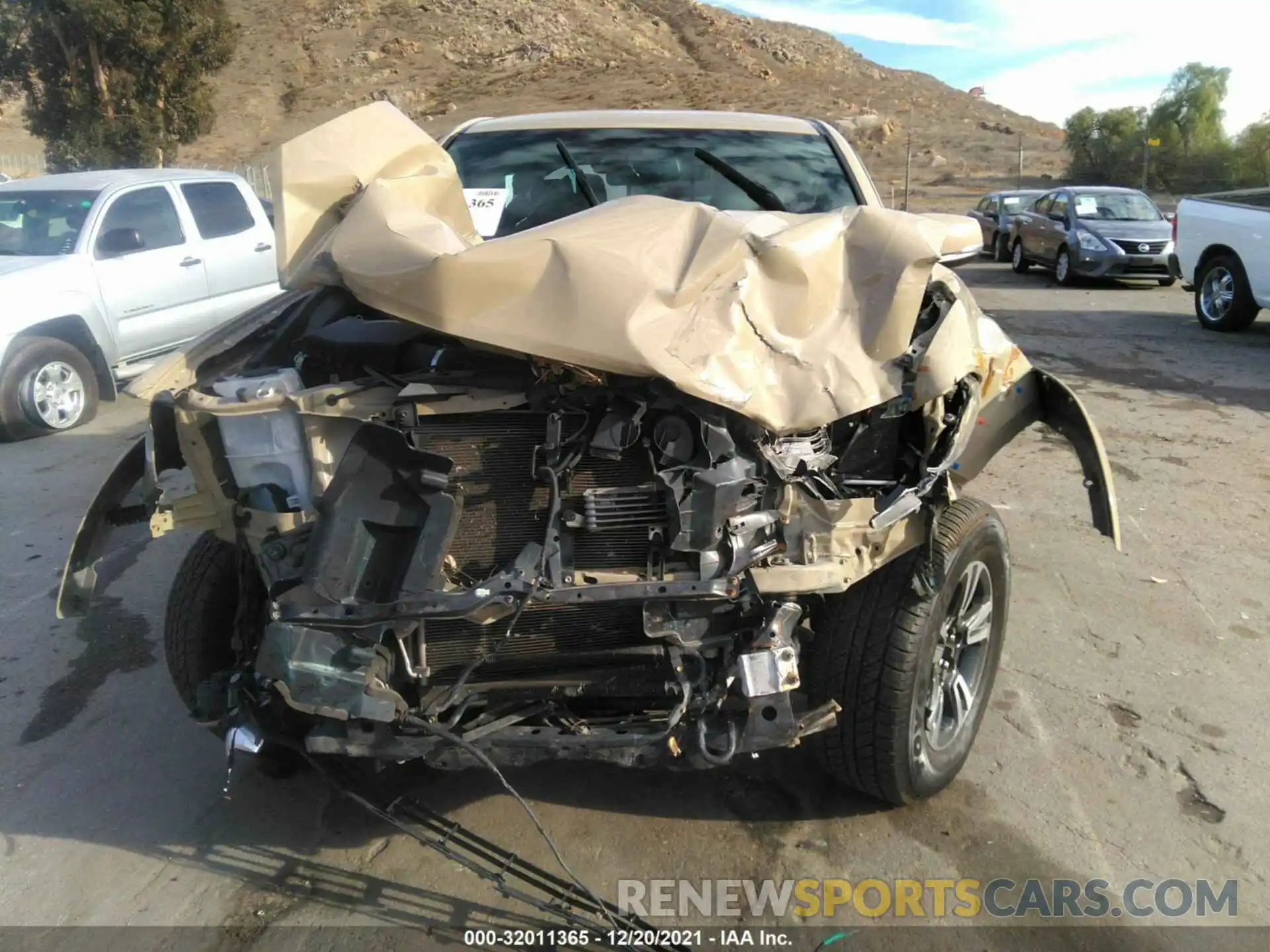 6 Photograph of a damaged car 3TMAZ5CN2KM103256 TOYOTA TACOMA 2WD 2019