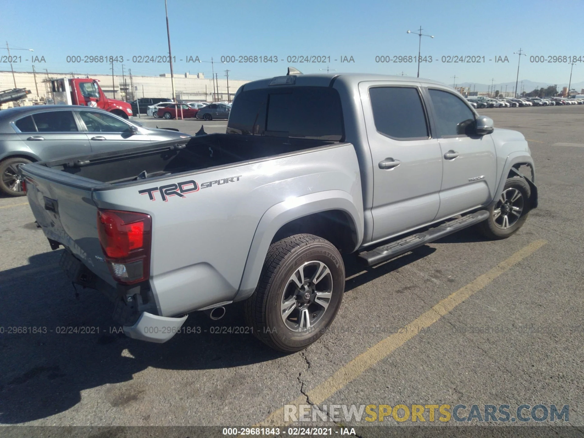 4 Photograph of a damaged car 3TMAZ5CN2KM108313 TOYOTA TACOMA 2WD 2019