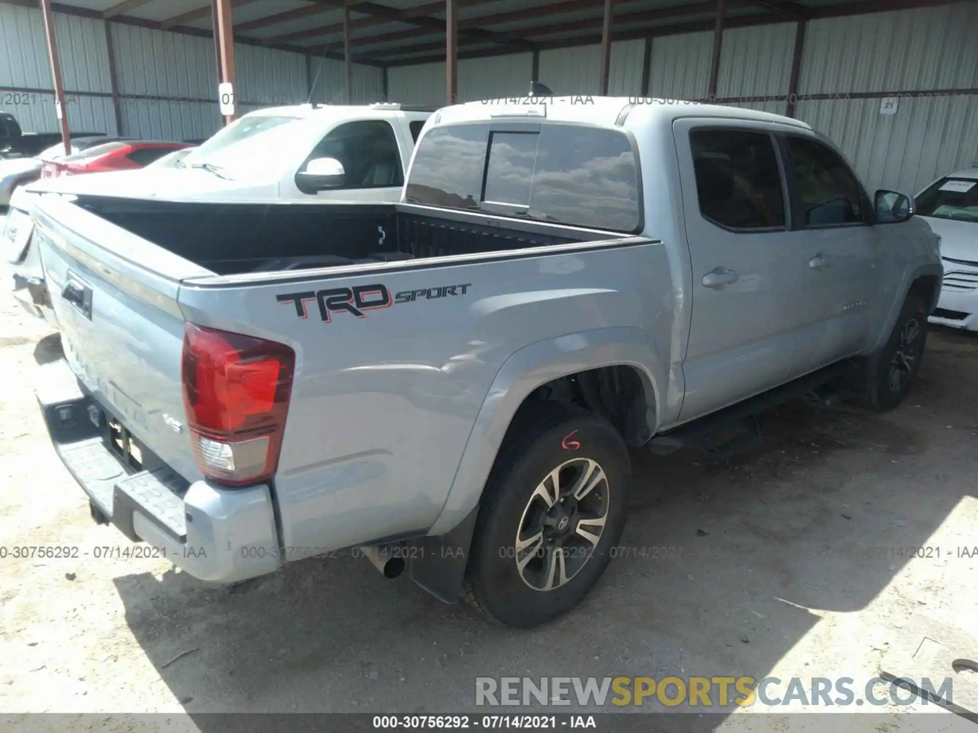 4 Photograph of a damaged car 3TMAZ5CN2KM110269 TOYOTA TACOMA 2WD 2019