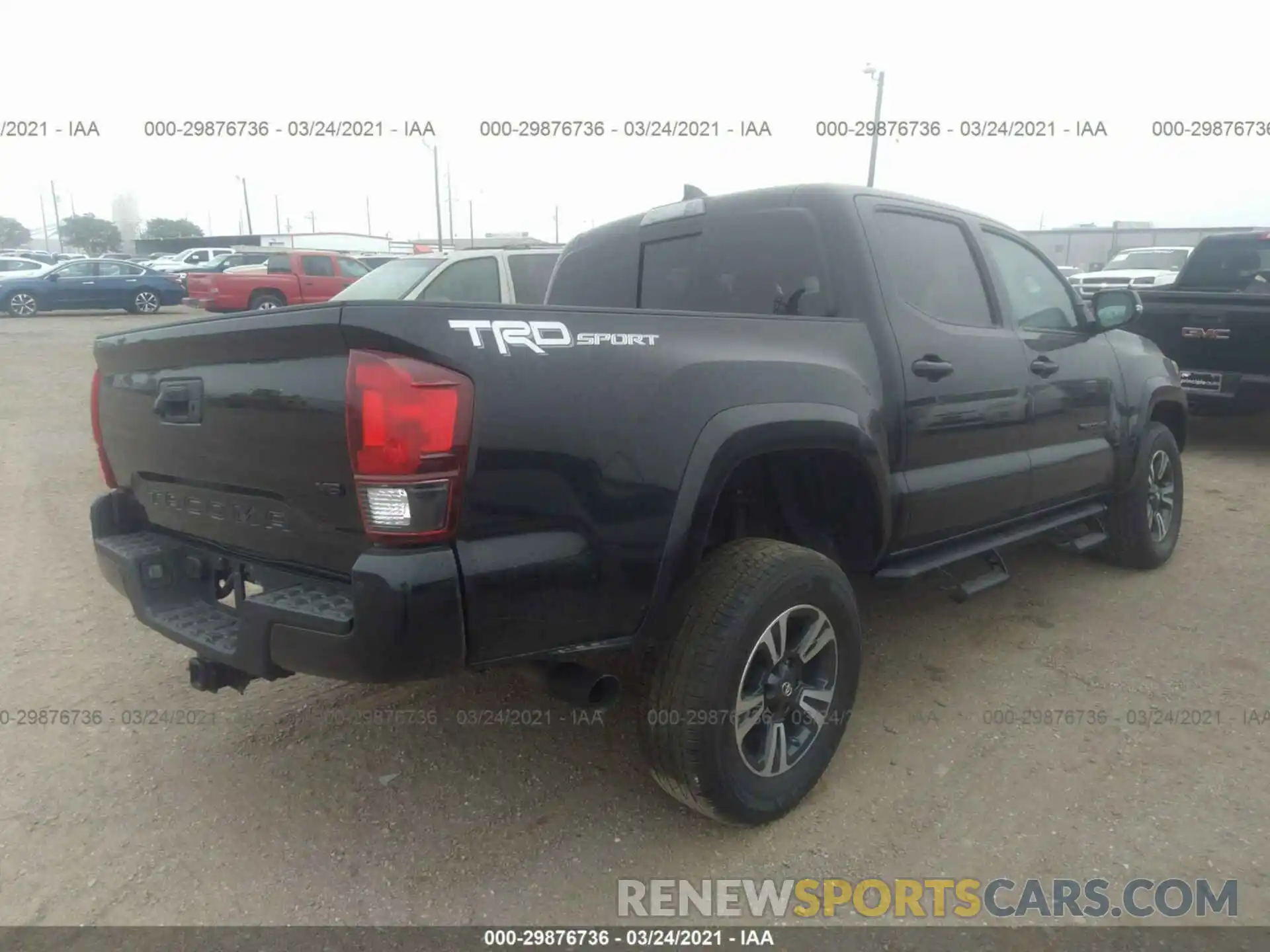 4 Photograph of a damaged car 3TMAZ5CN2KM111549 TOYOTA TACOMA 2WD 2019