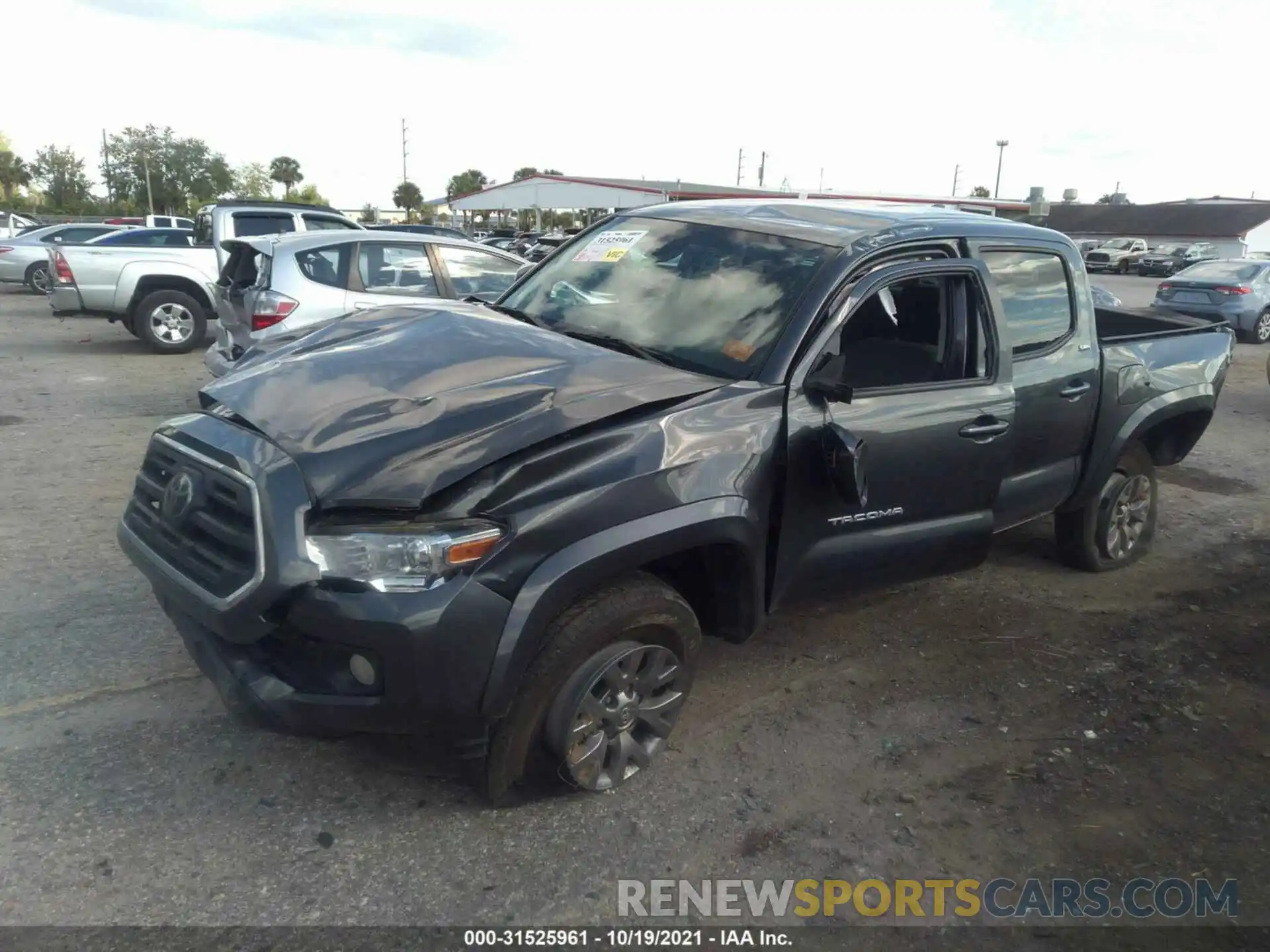 2 Photograph of a damaged car 3TMAZ5CN3KM085351 TOYOTA TACOMA 2WD 2019