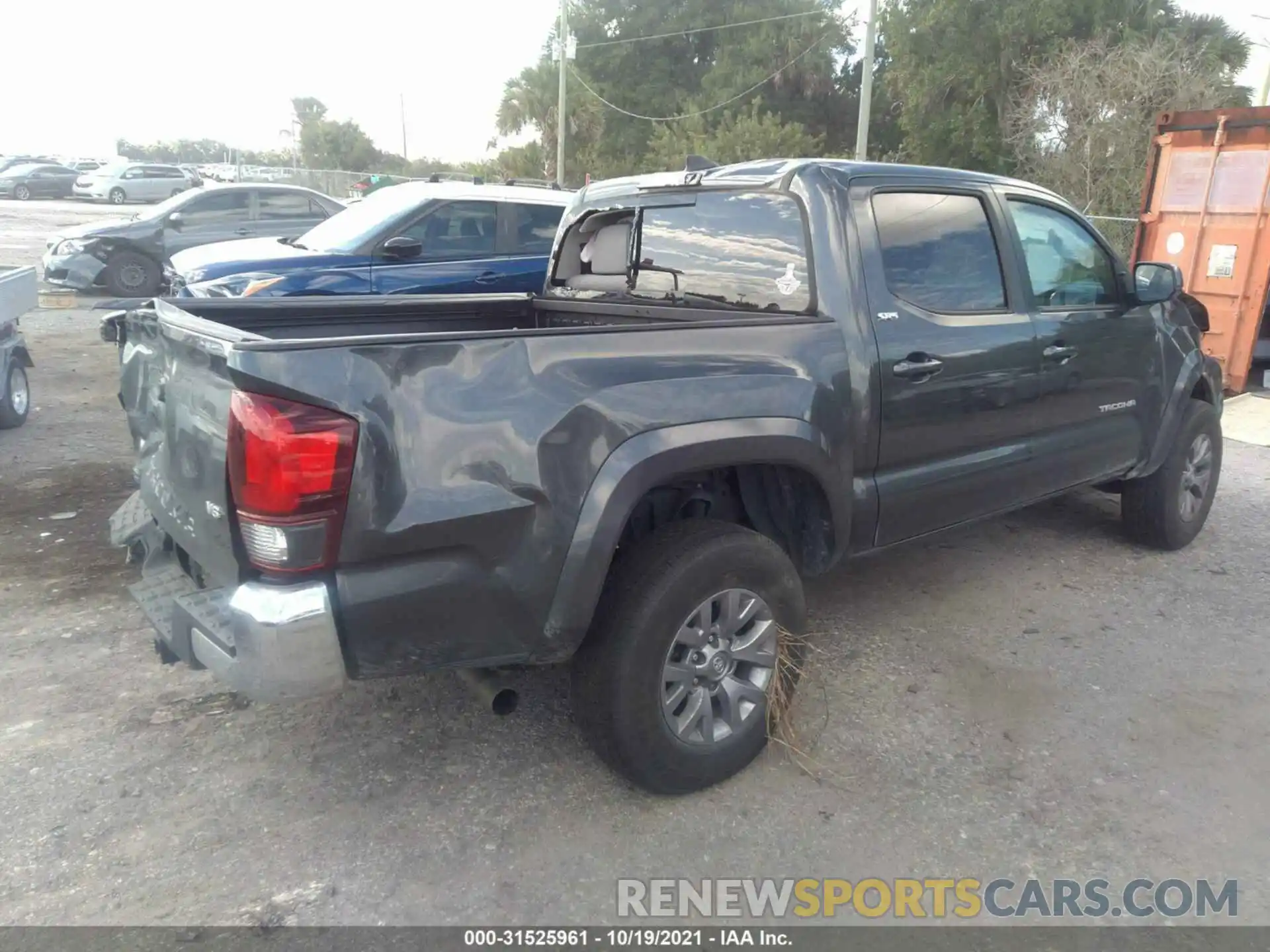 4 Photograph of a damaged car 3TMAZ5CN3KM085351 TOYOTA TACOMA 2WD 2019