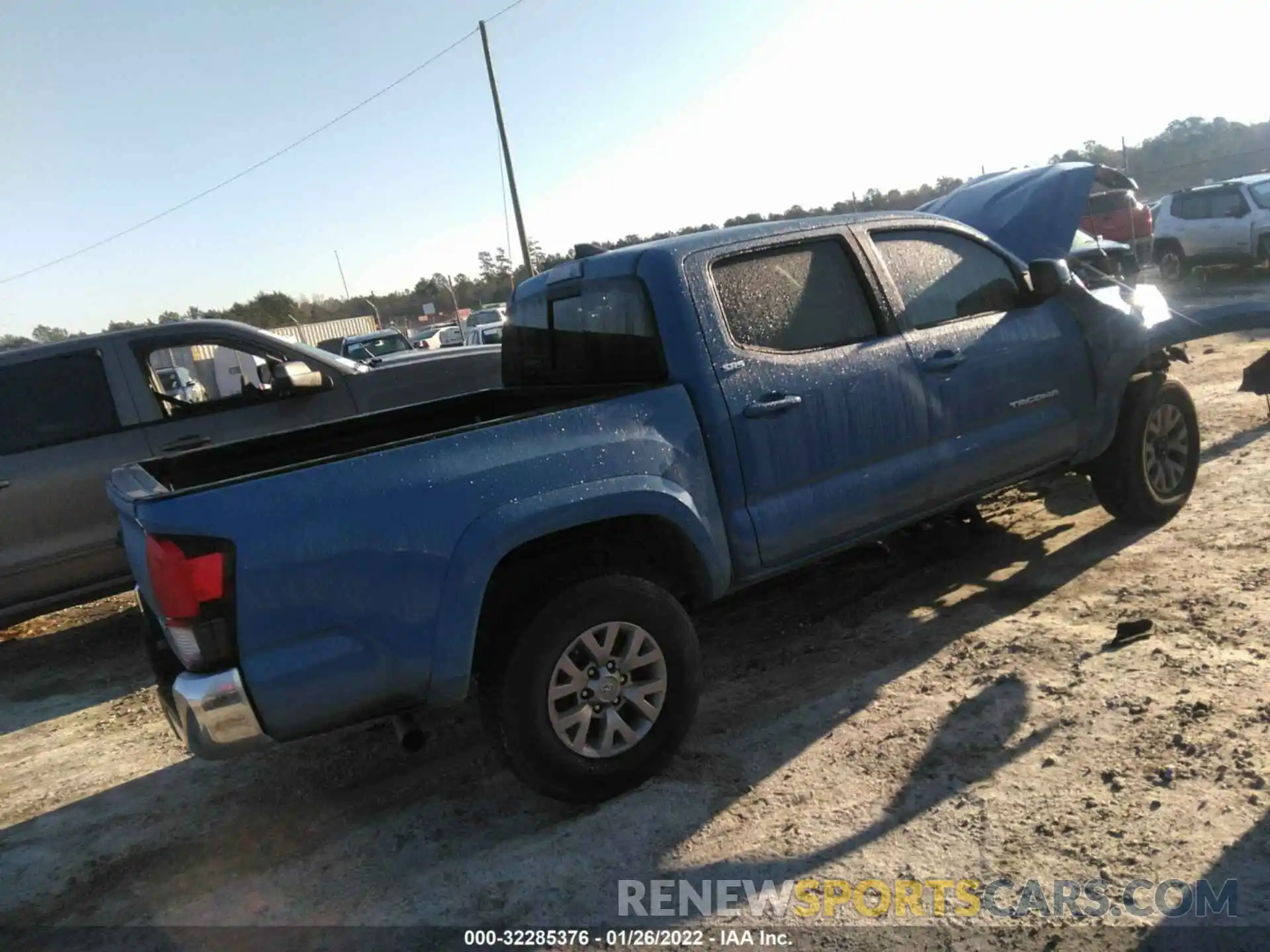 4 Photograph of a damaged car 3TMAZ5CN3KM095863 TOYOTA TACOMA 2WD 2019