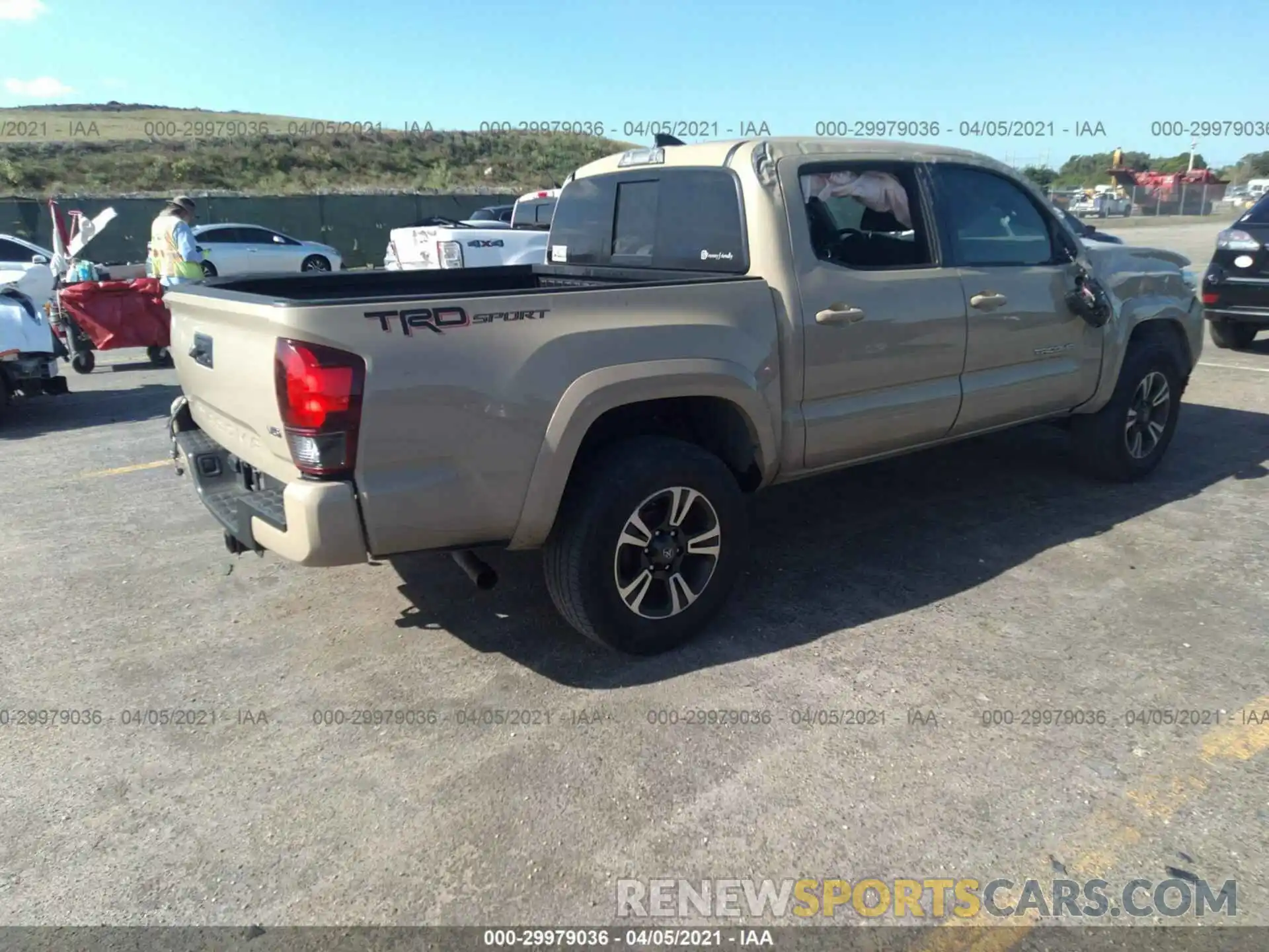 4 Photograph of a damaged car 3TMAZ5CN3KM096365 TOYOTA TACOMA 2WD 2019