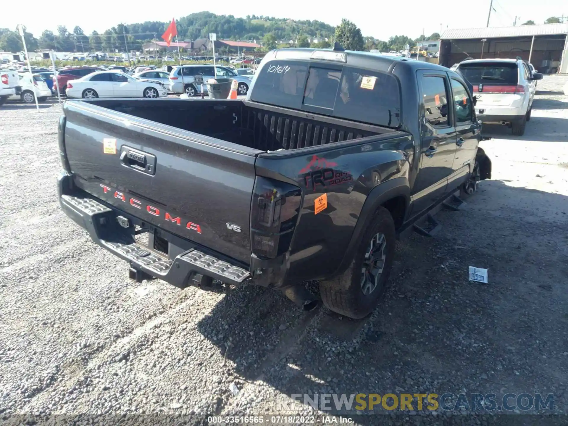 4 Photograph of a damaged car 3TMAZ5CN3KM101614 TOYOTA TACOMA 2WD 2019