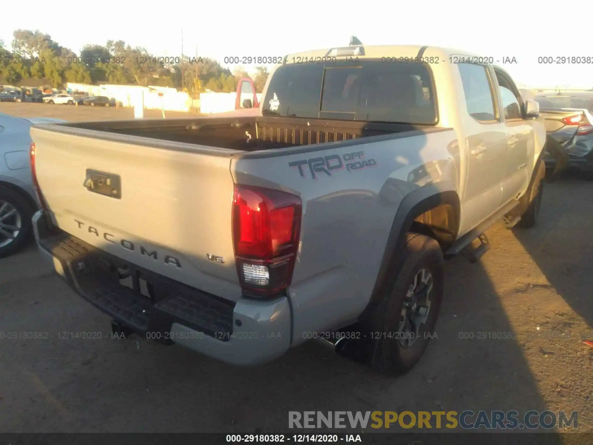 4 Photograph of a damaged car 3TMAZ5CN3KM114413 TOYOTA TACOMA 2WD 2019