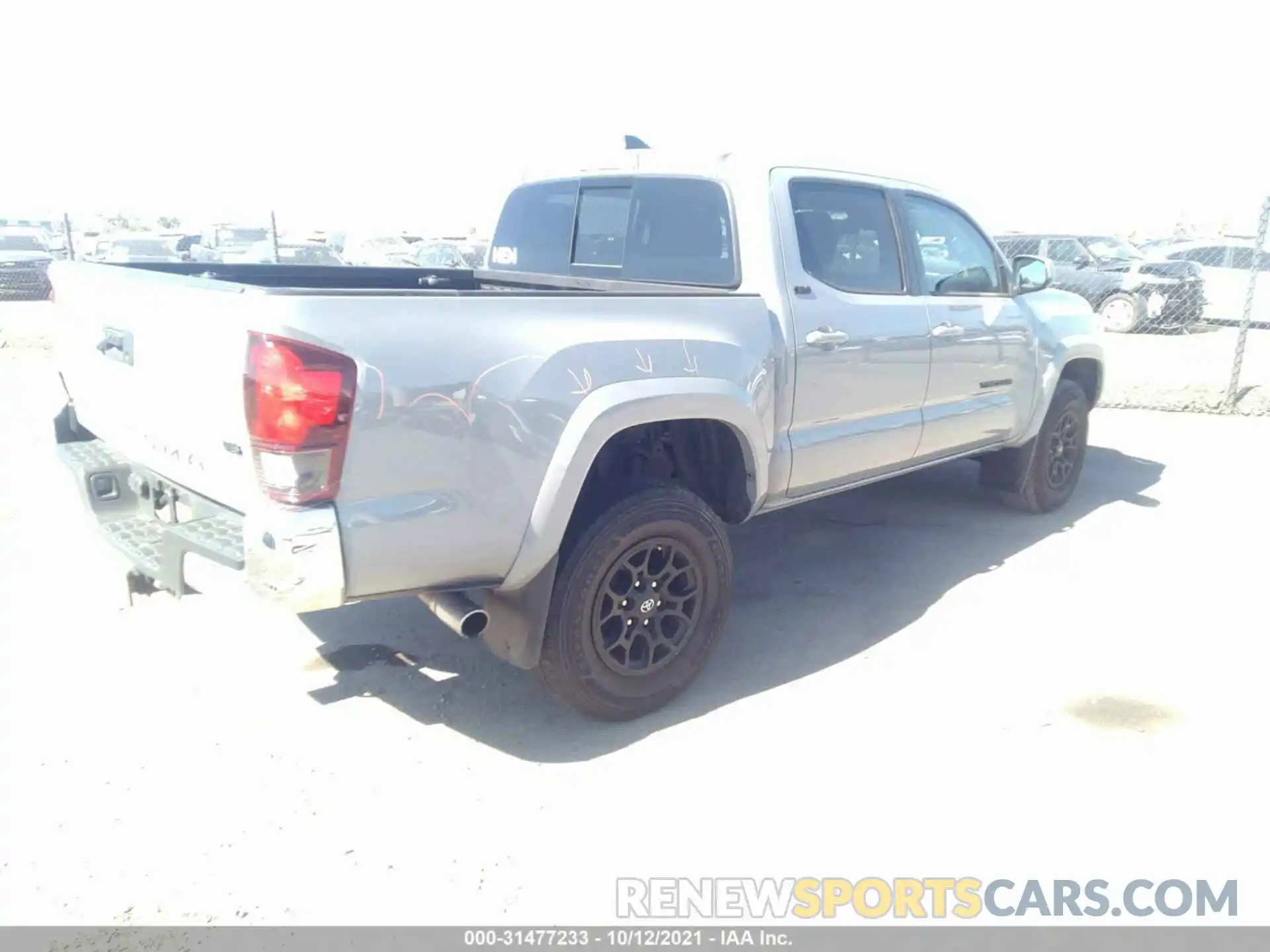 4 Photograph of a damaged car 3TMAZ5CN4KM084001 TOYOTA TACOMA 2WD 2019