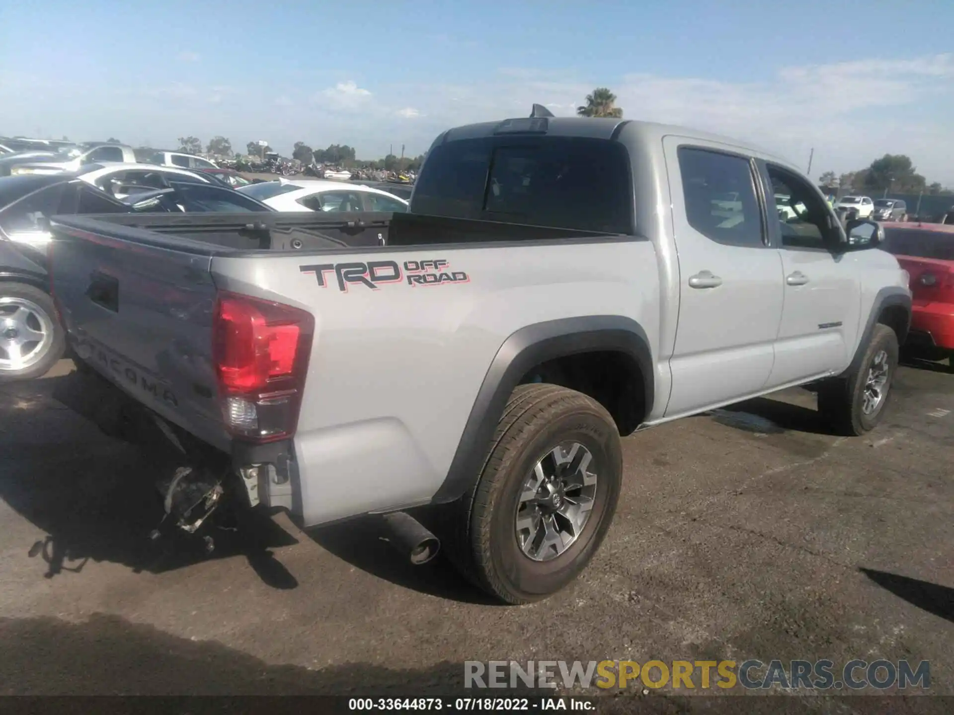 4 Photograph of a damaged car 3TMAZ5CN4KM094334 TOYOTA TACOMA 2WD 2019