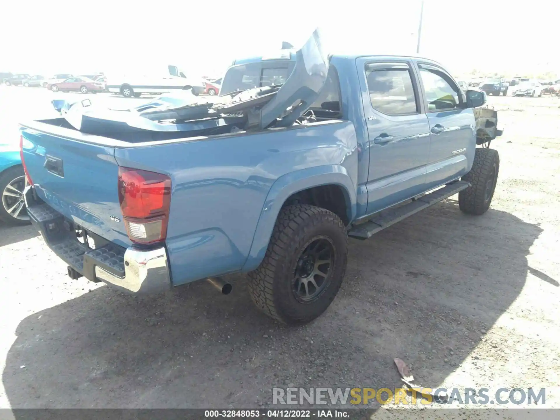 4 Photograph of a damaged car 3TMAZ5CN4KM098741 TOYOTA TACOMA 2WD 2019