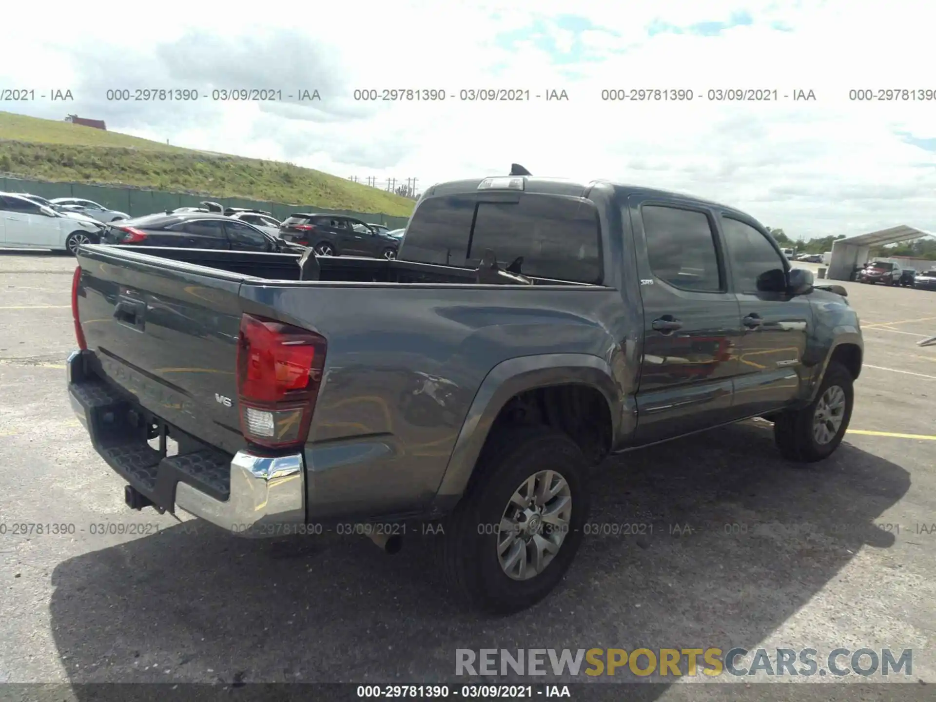 4 Photograph of a damaged car 3TMAZ5CN5KM114154 TOYOTA TACOMA 2WD 2019