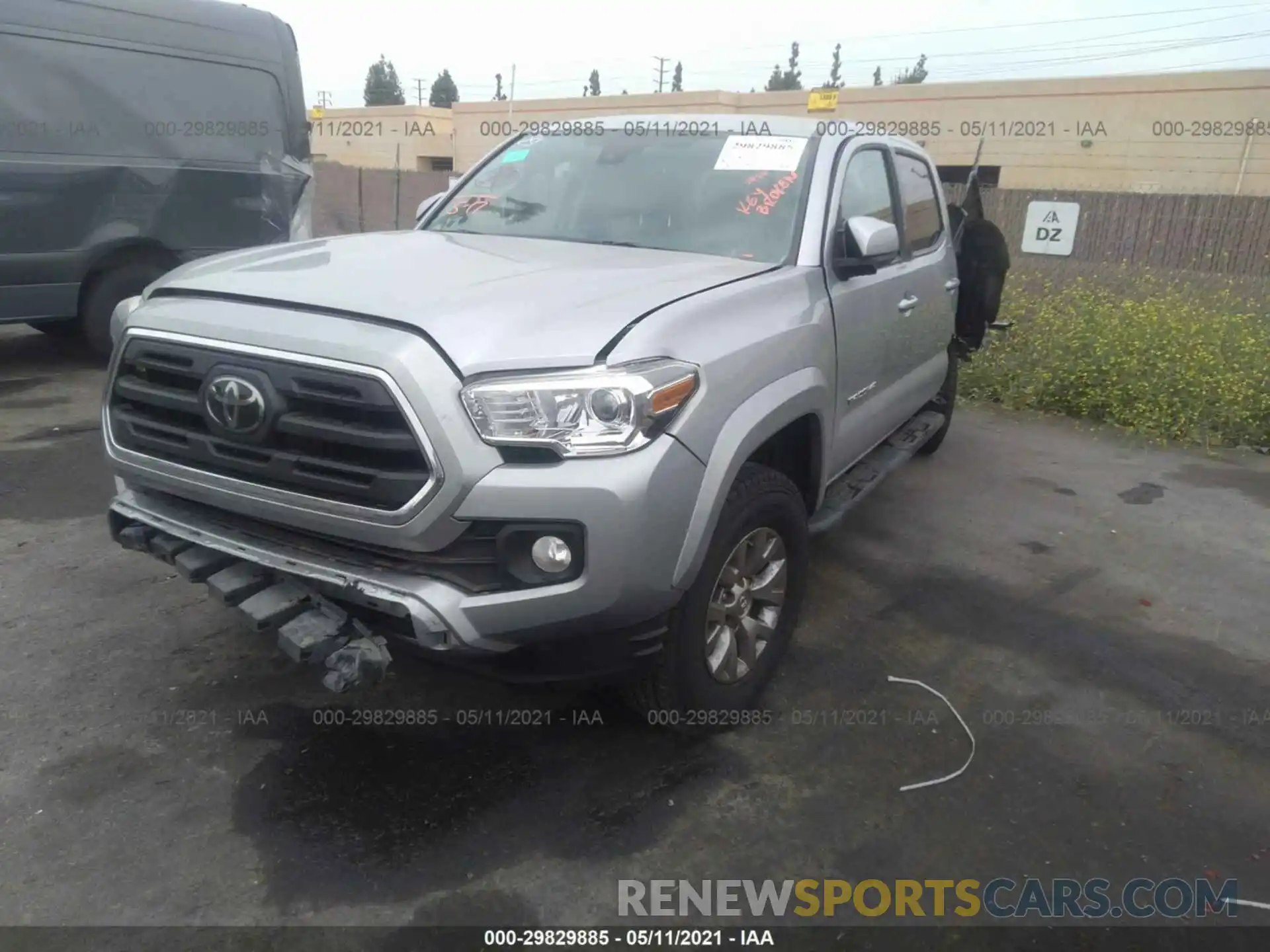 2 Photograph of a damaged car 3TMAZ5CN6KM090169 TOYOTA TACOMA 2WD 2019