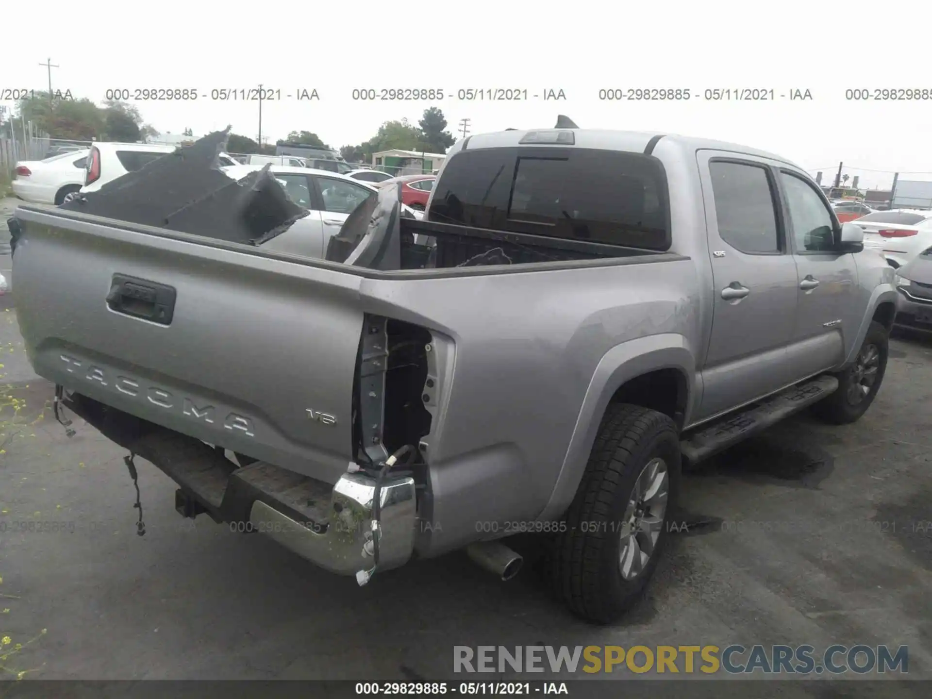 4 Photograph of a damaged car 3TMAZ5CN6KM090169 TOYOTA TACOMA 2WD 2019